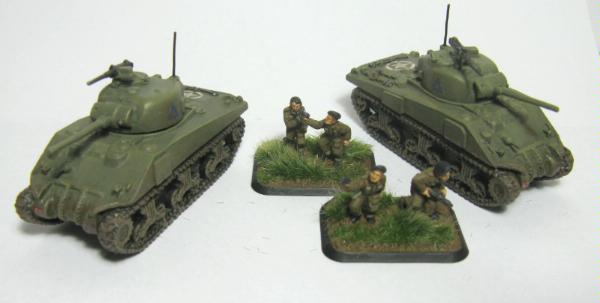 And finally a better scale picture of the crew next to their tanks: