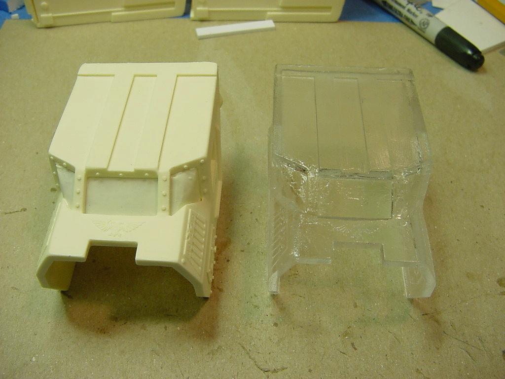 The clear head next to the resin head 2
