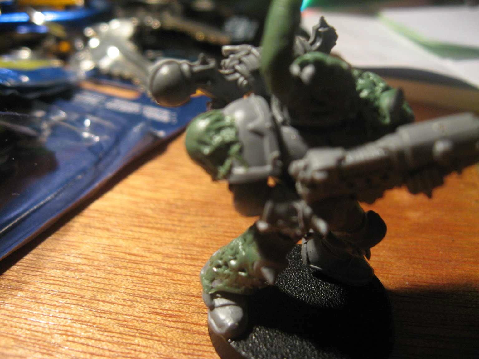 Side view of chaos marine number 2. He has some pestilence on his leg