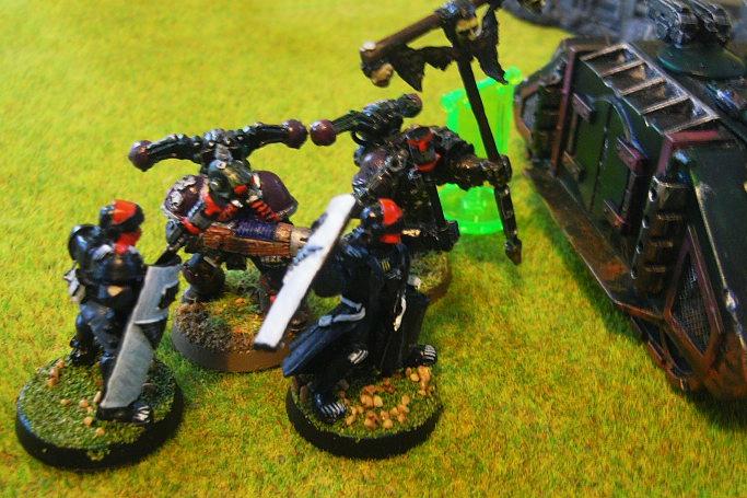 Battle Report, the rest of his squad is dieing