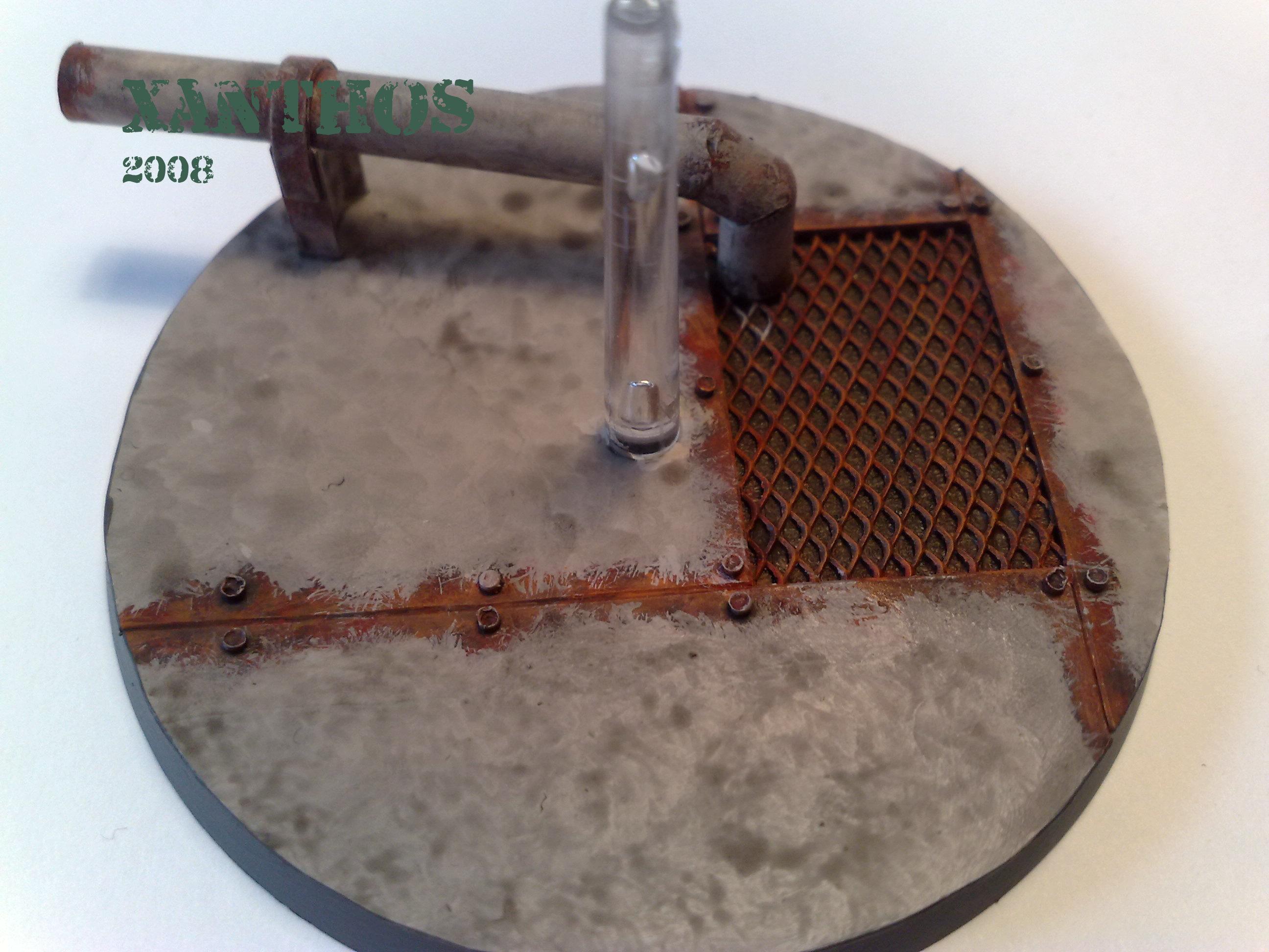 The base. As you can see, it´s rusted plating