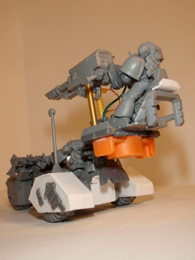 Four wheeled bike with Lascannon/rear view
