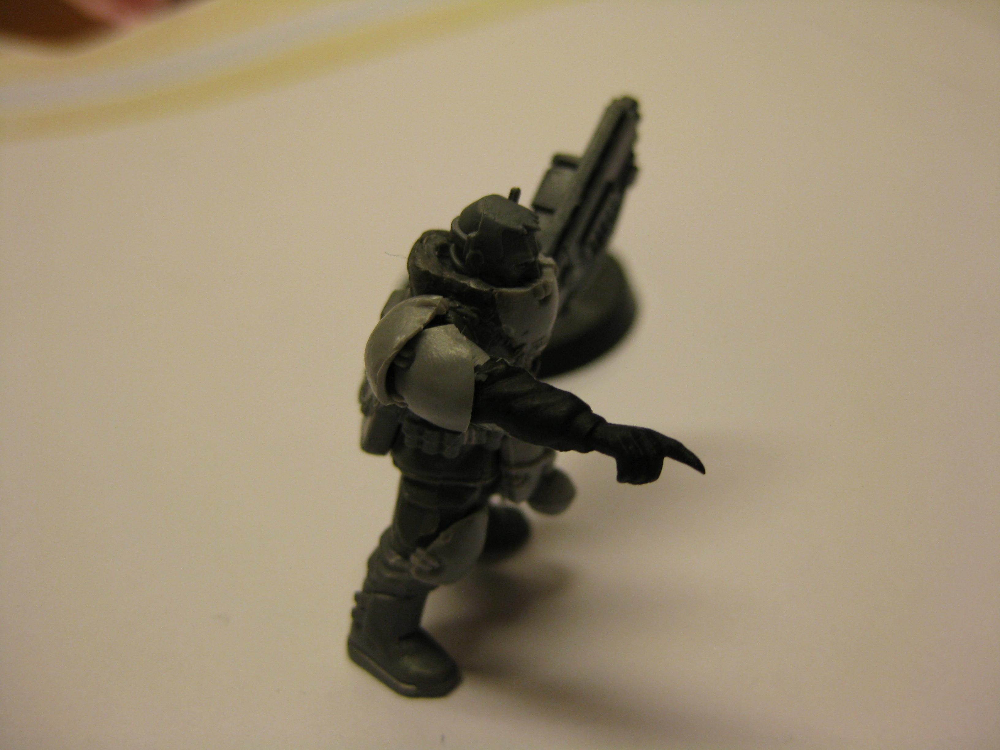 The shoulder guards on the right arm