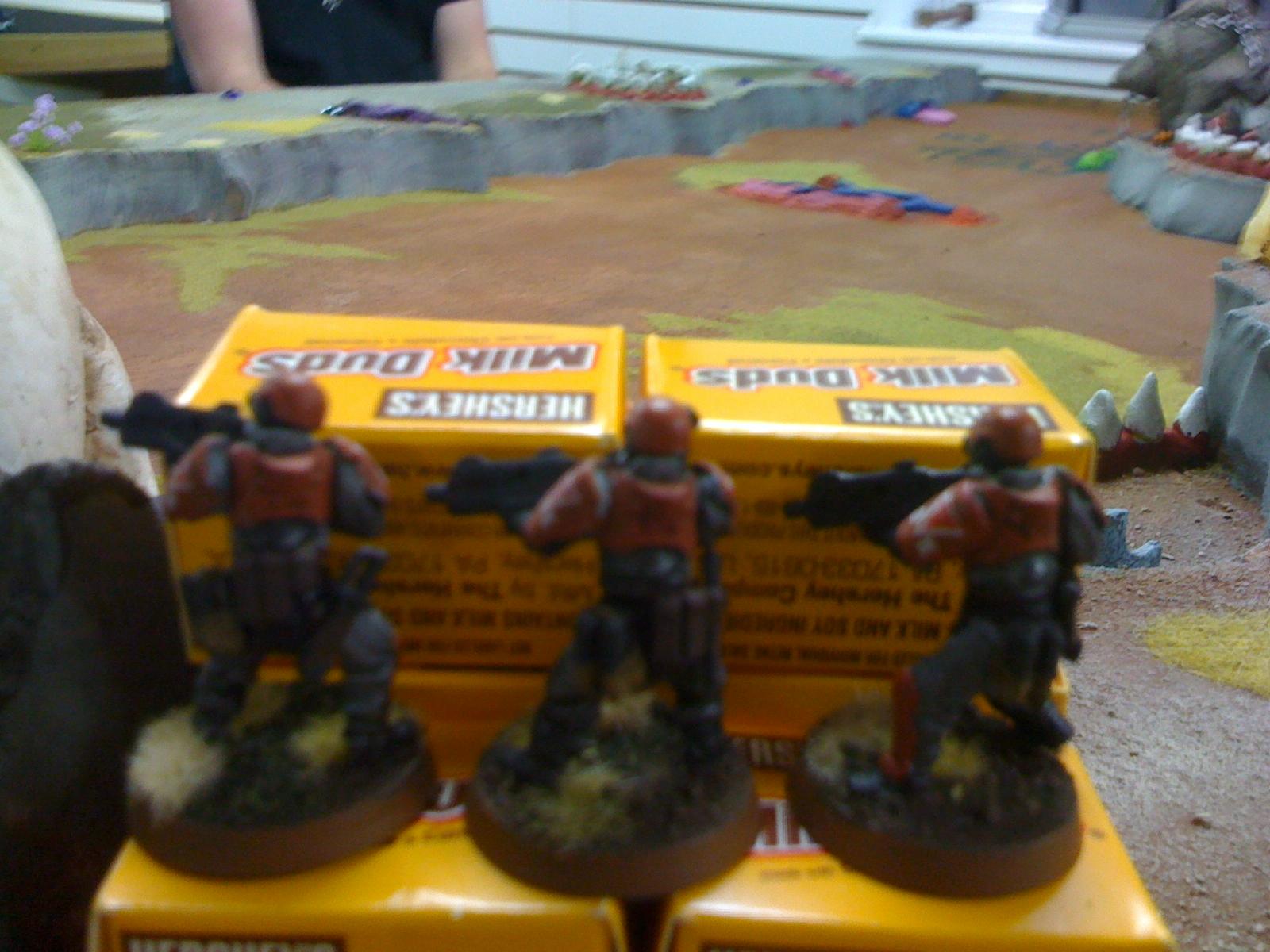 Guardsman overwatching the feild. In a barricade of milk duds