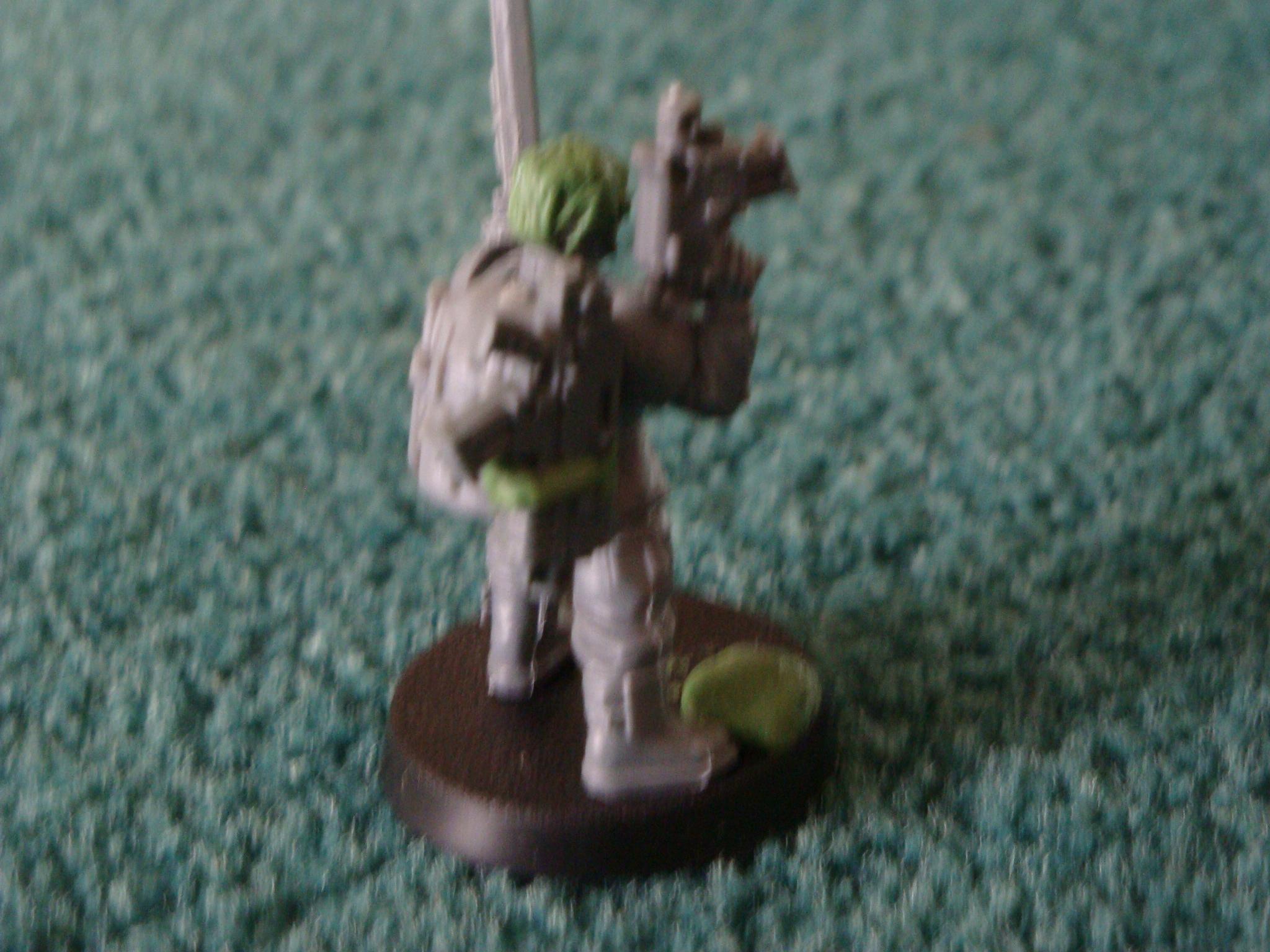His backpack with the bolter attached