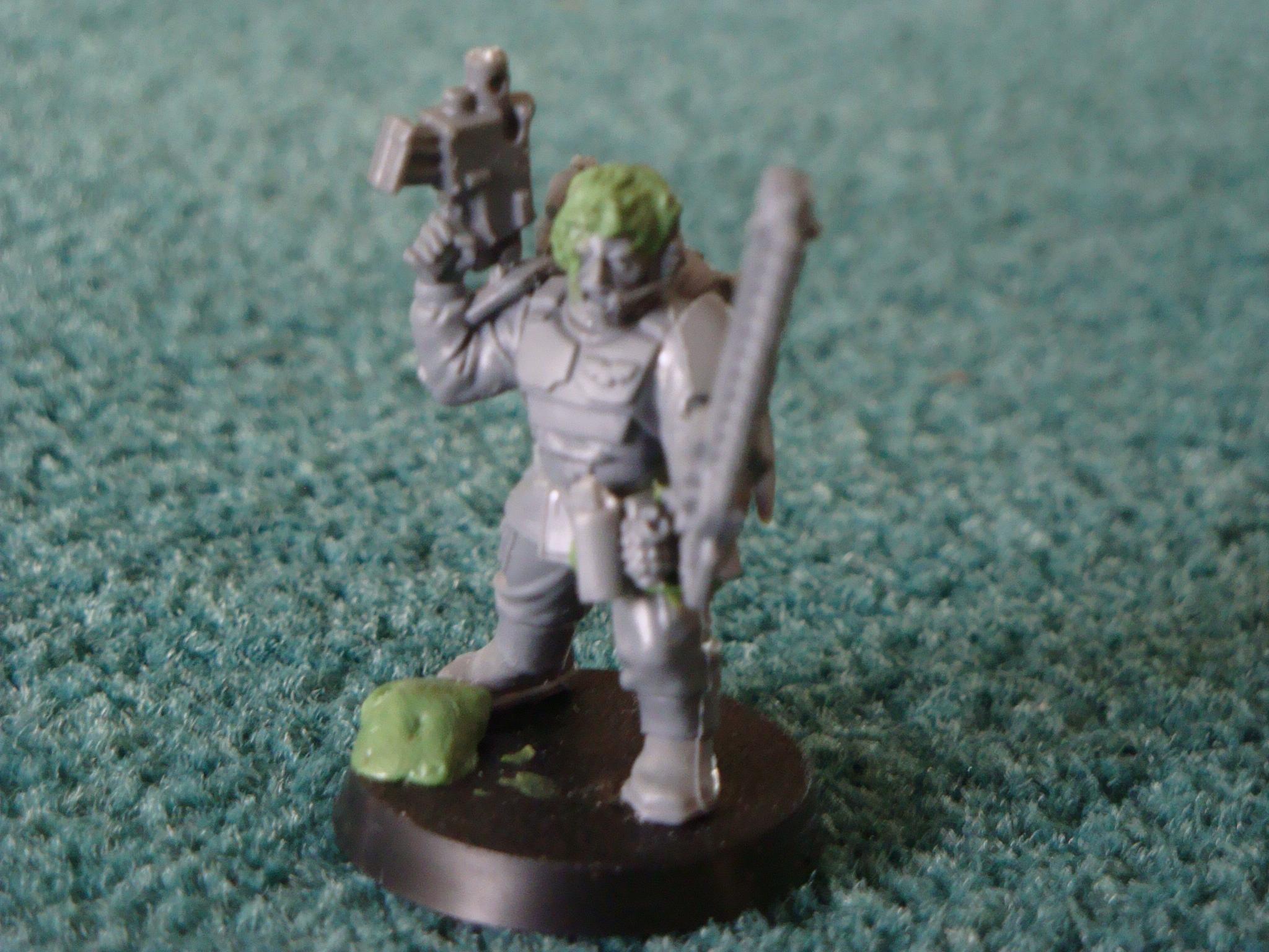 Here is commander Drakos Sandstorm: His head is modelled out of a normal cadian sergeant head with hair sculpted on it and his backpack is a normal heavy weapon team backpack with a bolter greenstuffed on
