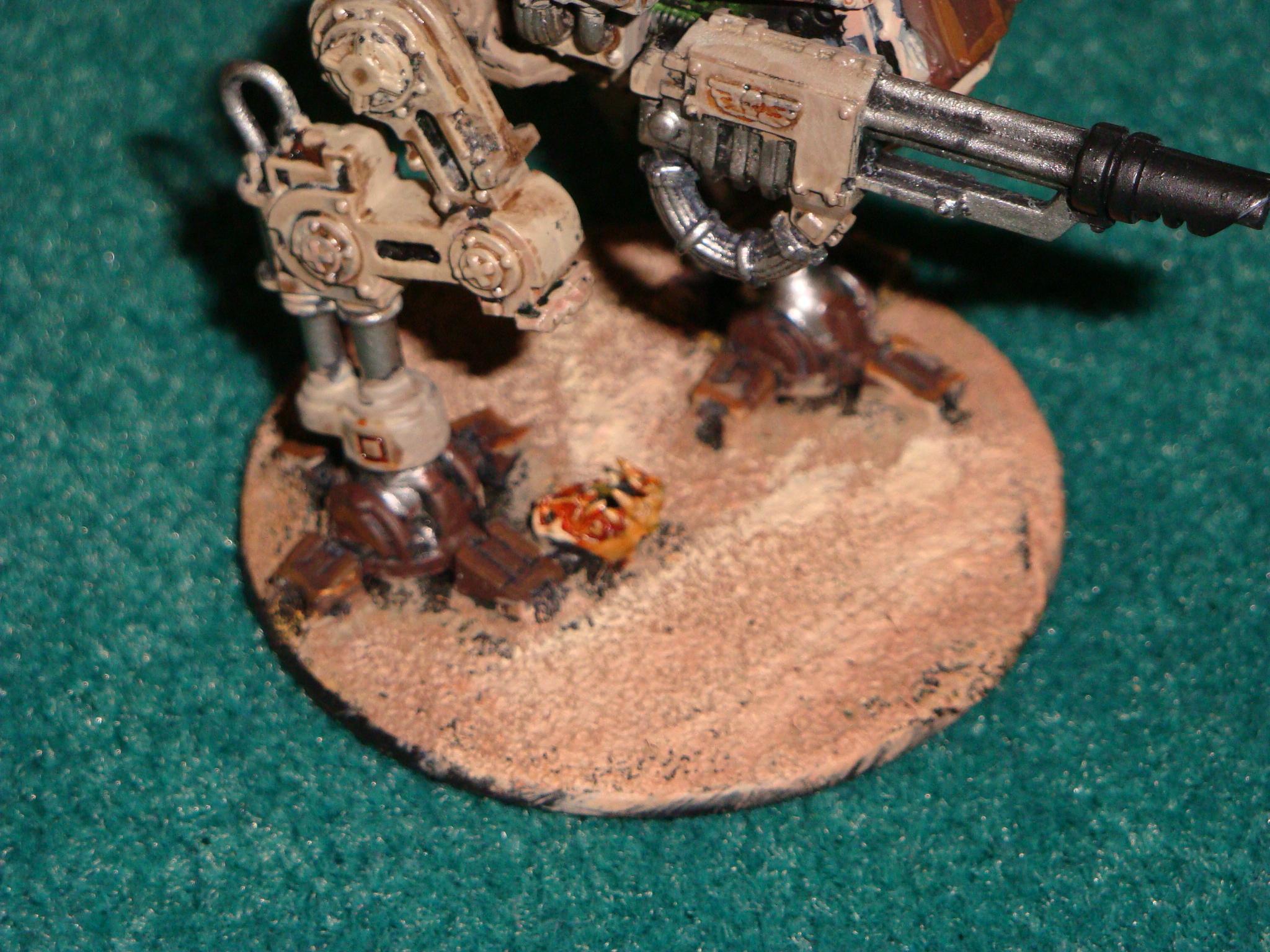 The base has an ork skull painted with bleached bone before a wash of chesnut ink (not available anymore)