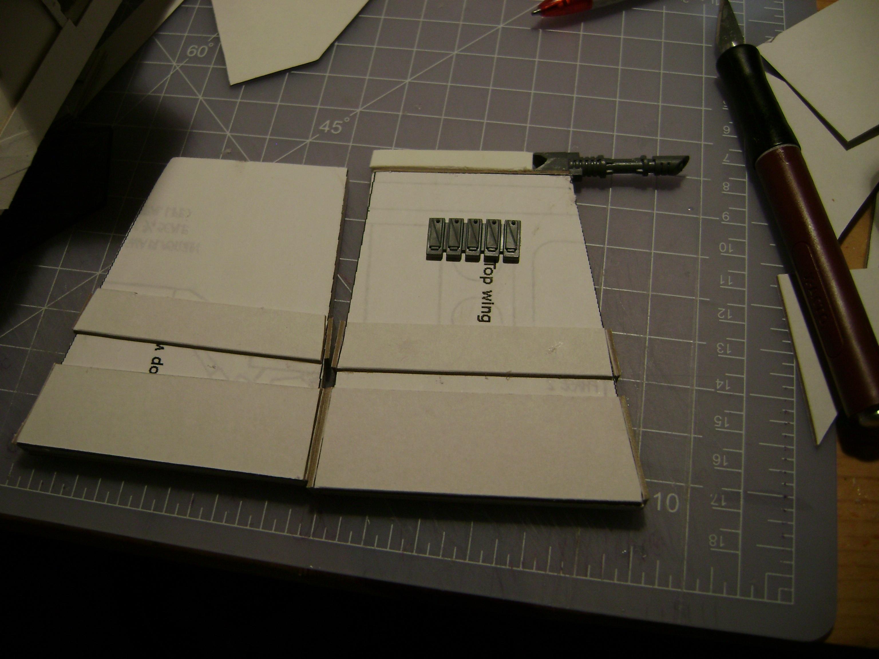 top wing and  my  first  GW parts on the  model so far( las cannons  for Predator  turret)