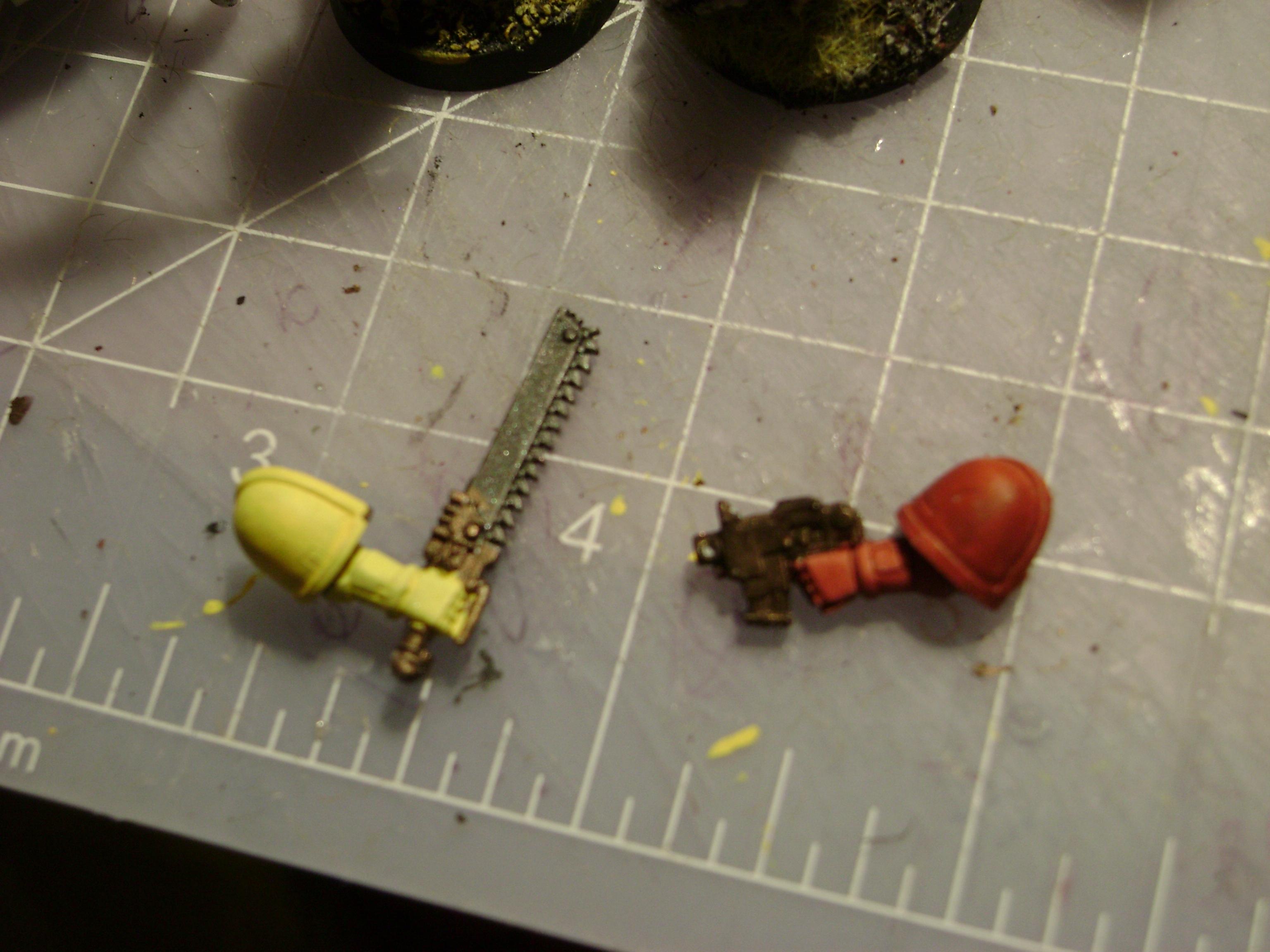  chain sword( scortched metal and adamantium black) bolt pistol   scortched metal before  dry brushing)