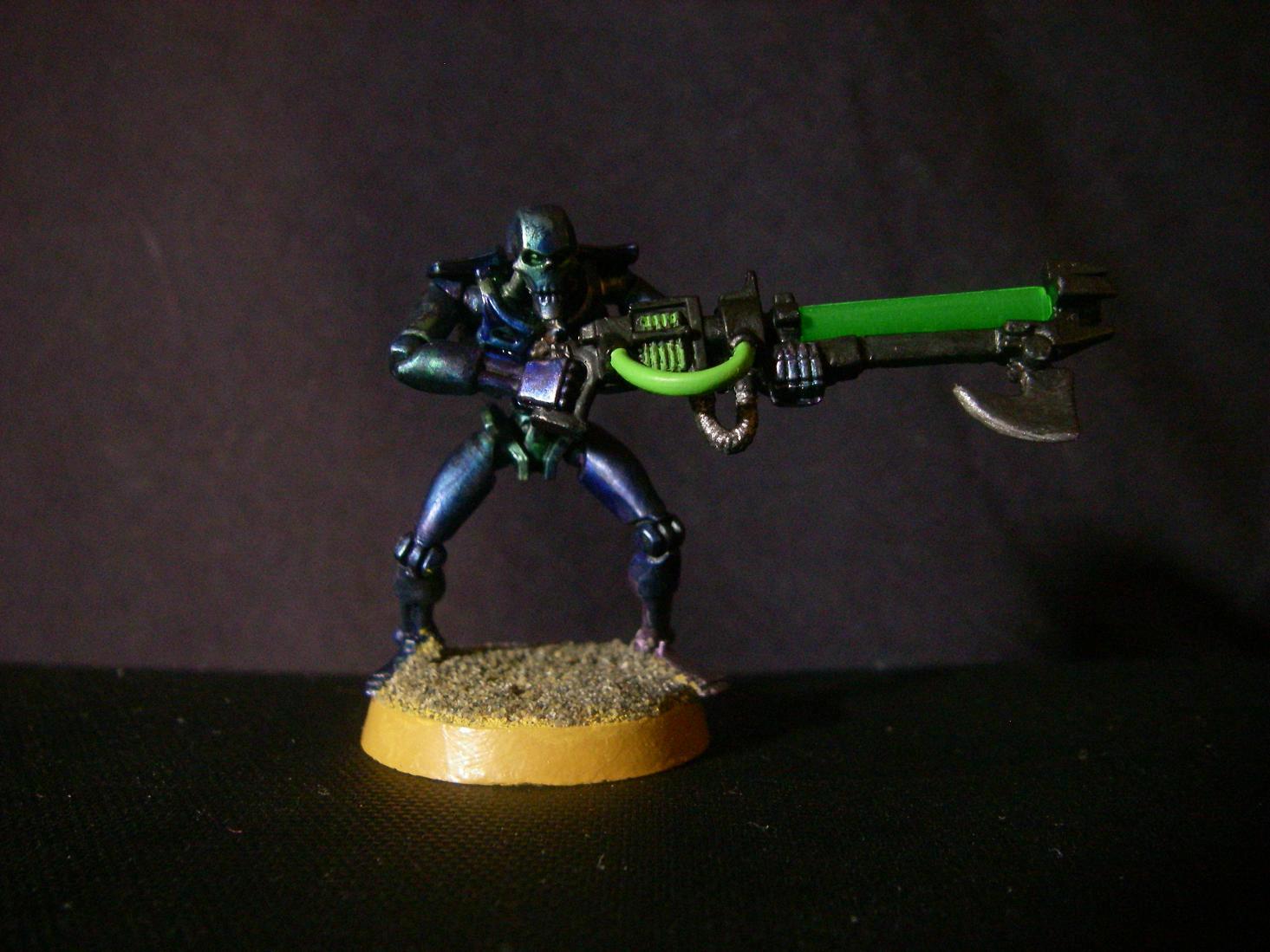 Necrons, More likely possible Necron paint scheme, rough coat.  Changed emblem to bolt gun metal with shining gold detail.  Blade and chain thing are made with home made darker metal and chainmail
