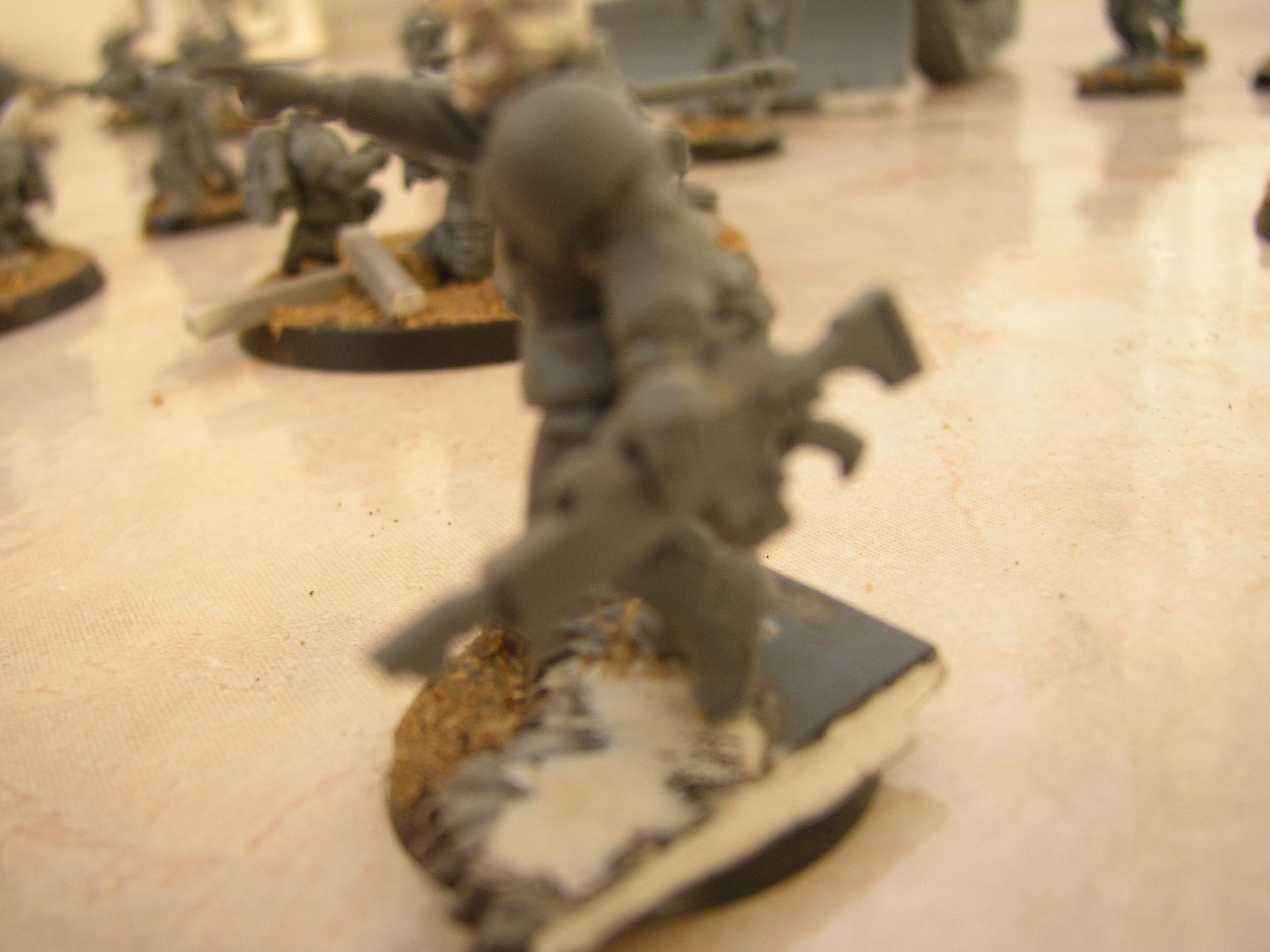 base detail and holding gun arm