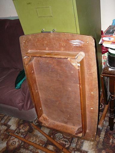 Underneath of table, where legs bolt on/off