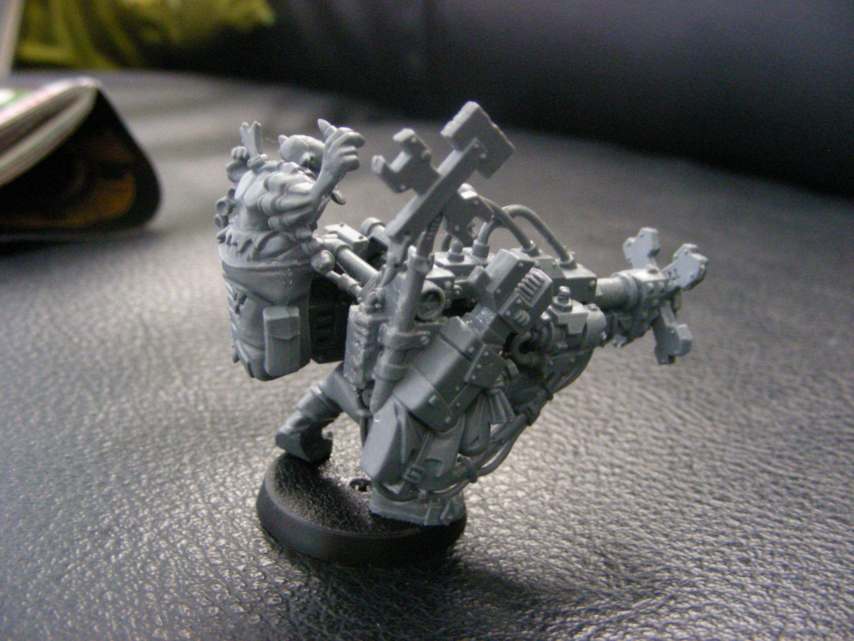 his trusty tools and his big gun with markerlight =) or something like it