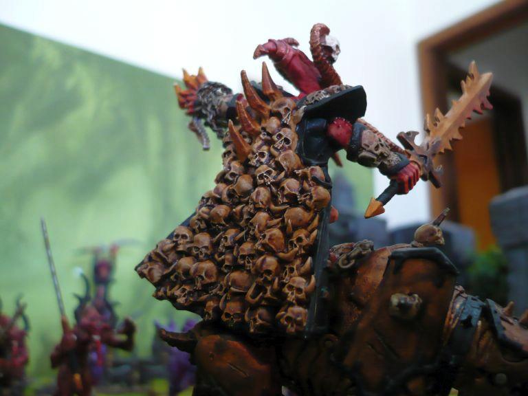 Skulltaker riding Juggernaught, back