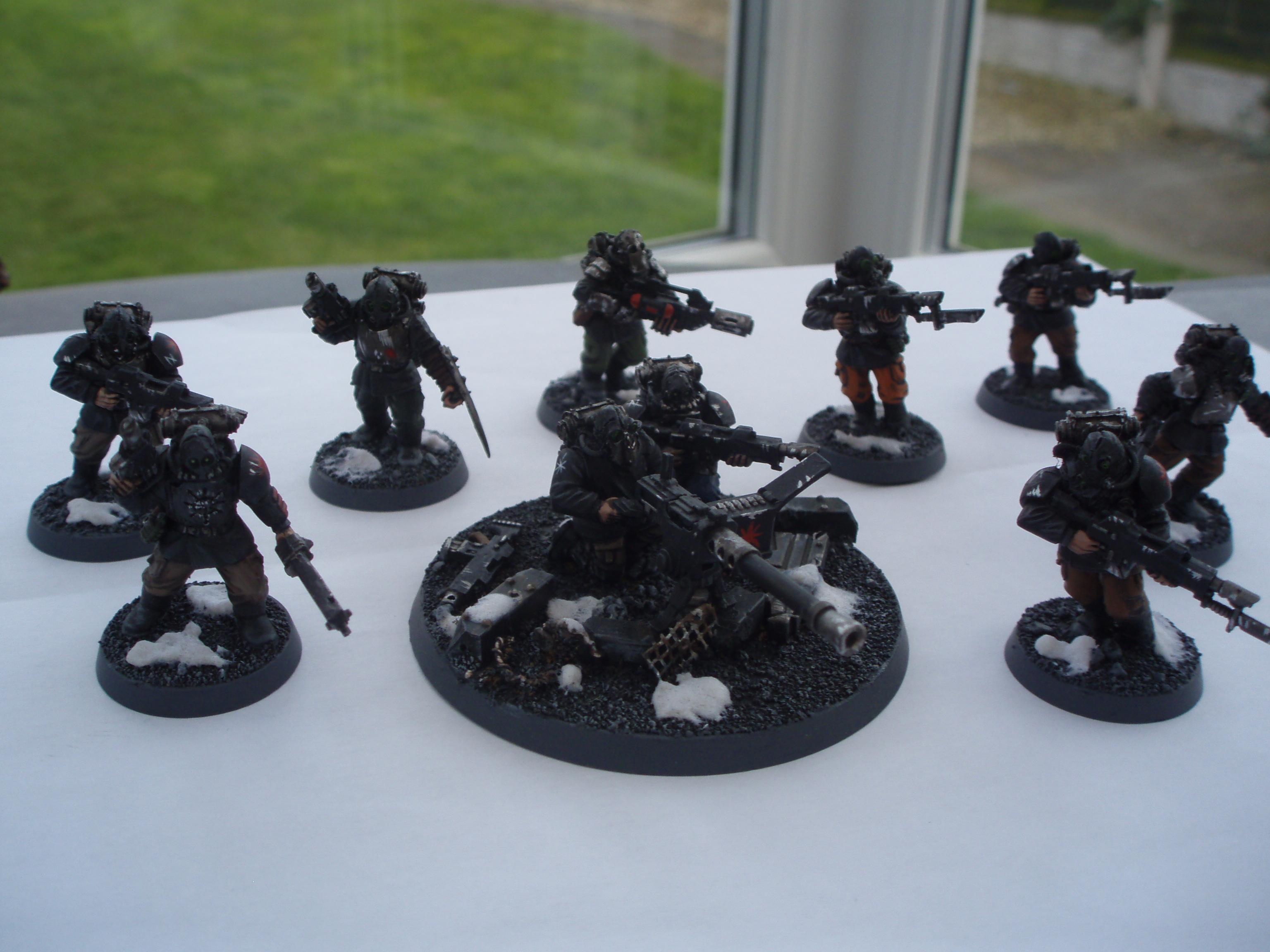 one of my infantry squads including some converted autoguns and heavy stubber crew