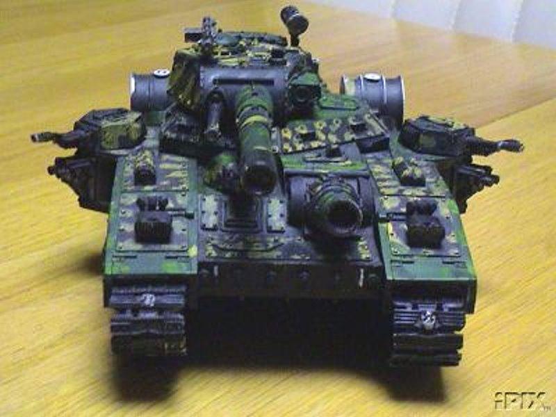 Not only was it painted thickly with paint and simulated mud but even the treads were installed upsidedown and mismatched