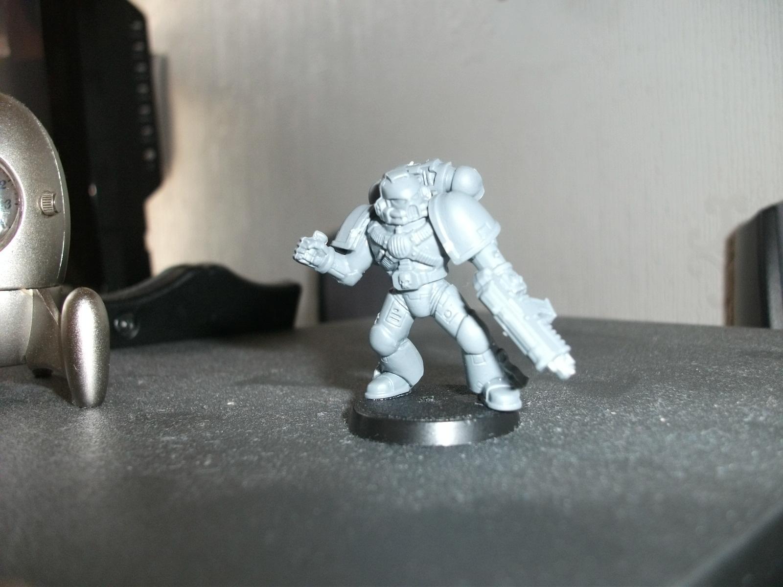 Grenade throwing marine (his pose has changed slightly he's leaning back 
