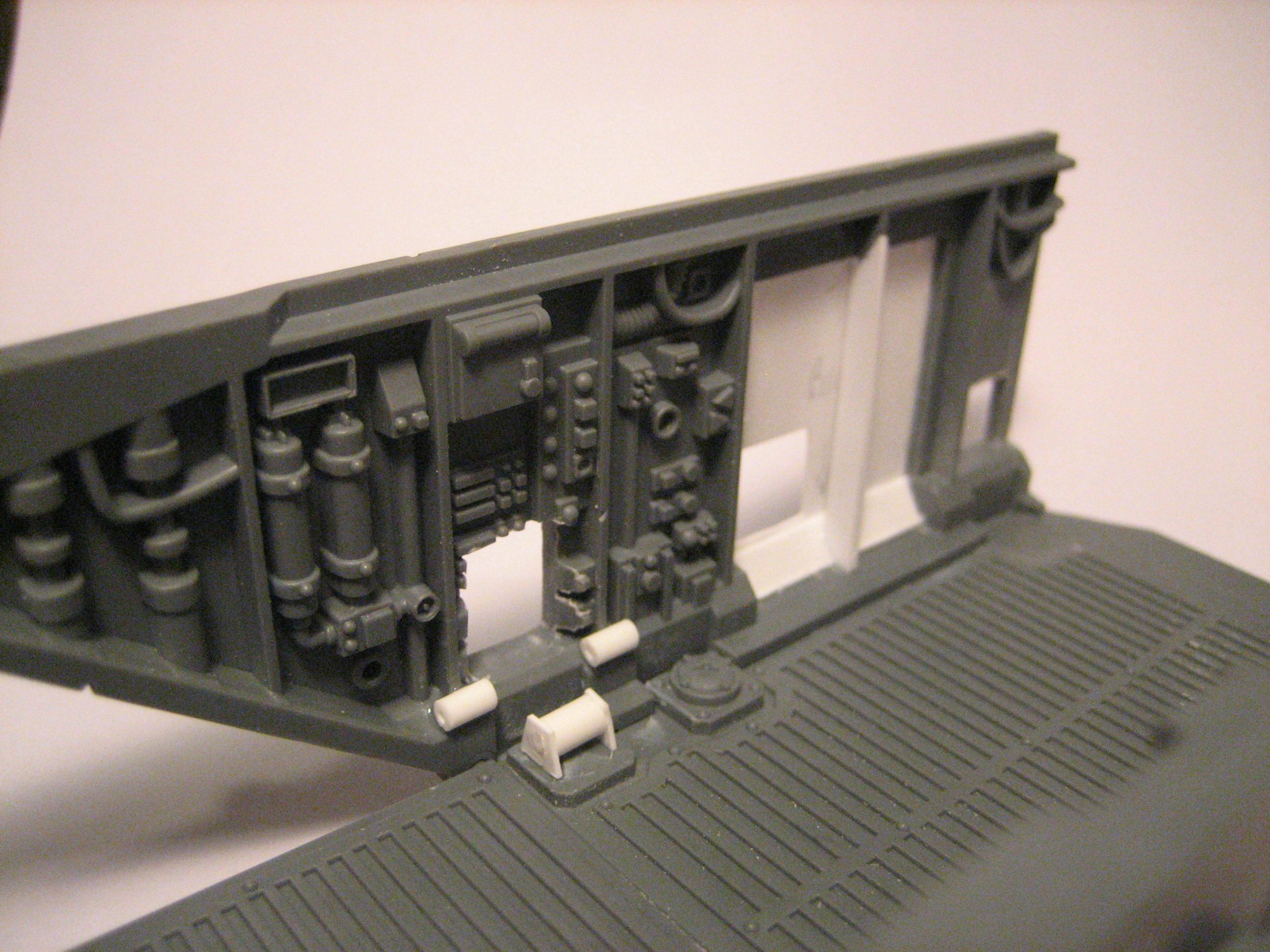 note the pivot points for some shock absorbers where the autocannon will go
