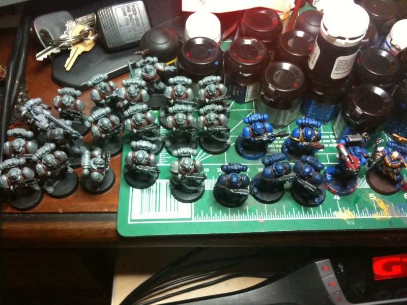 25 Marines, Started doing assembly line painting. I get the illusion I get more done this way
