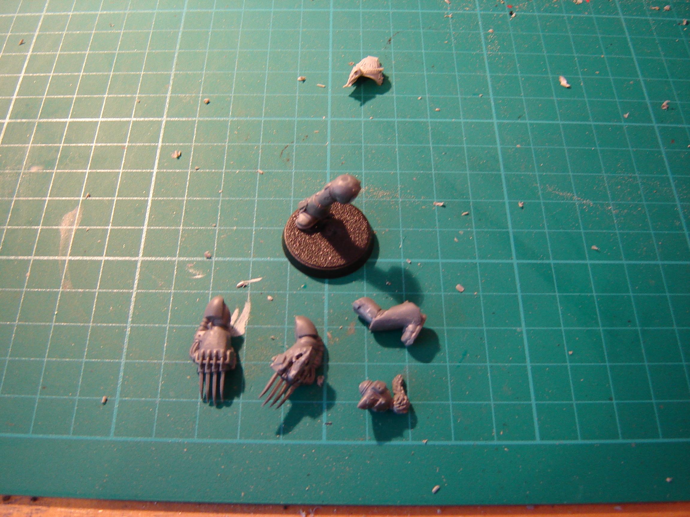 Shaving off the Space Wolves pieces..