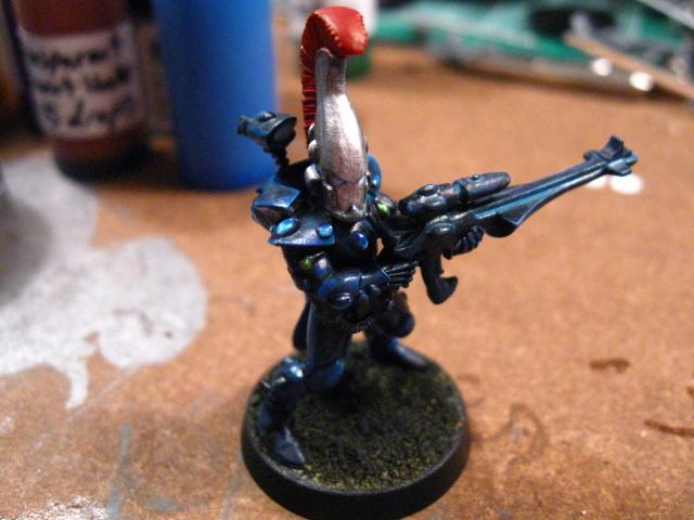 Eldar, blanded up to ice blue on the armour and the gemstones and washed with my own Prussian Blue courtesy of LBursley's wash recipe, much thanks!