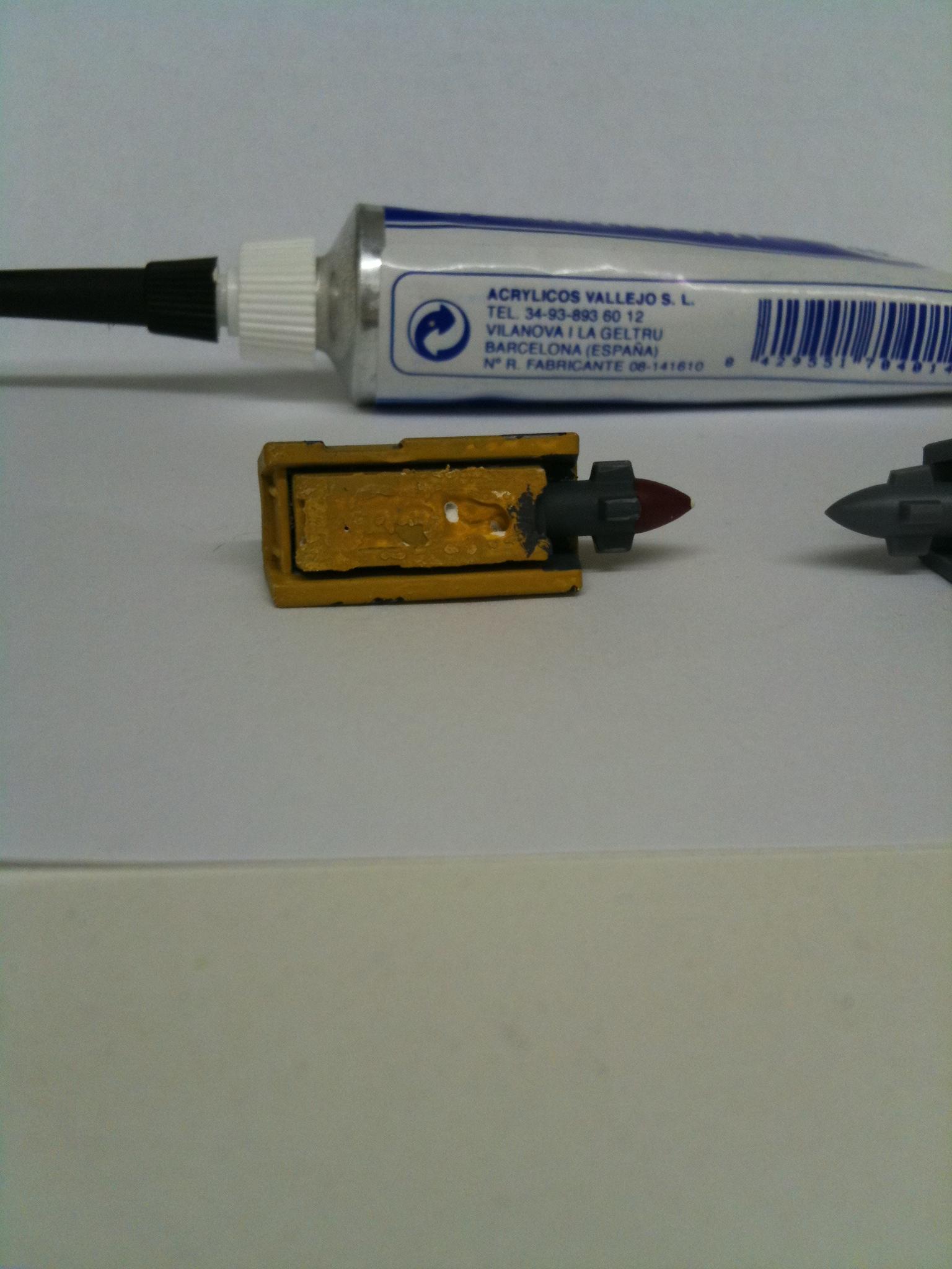 so you have to put your magnet in the rectangular hole fill it with putty ,let it dry and youre done!