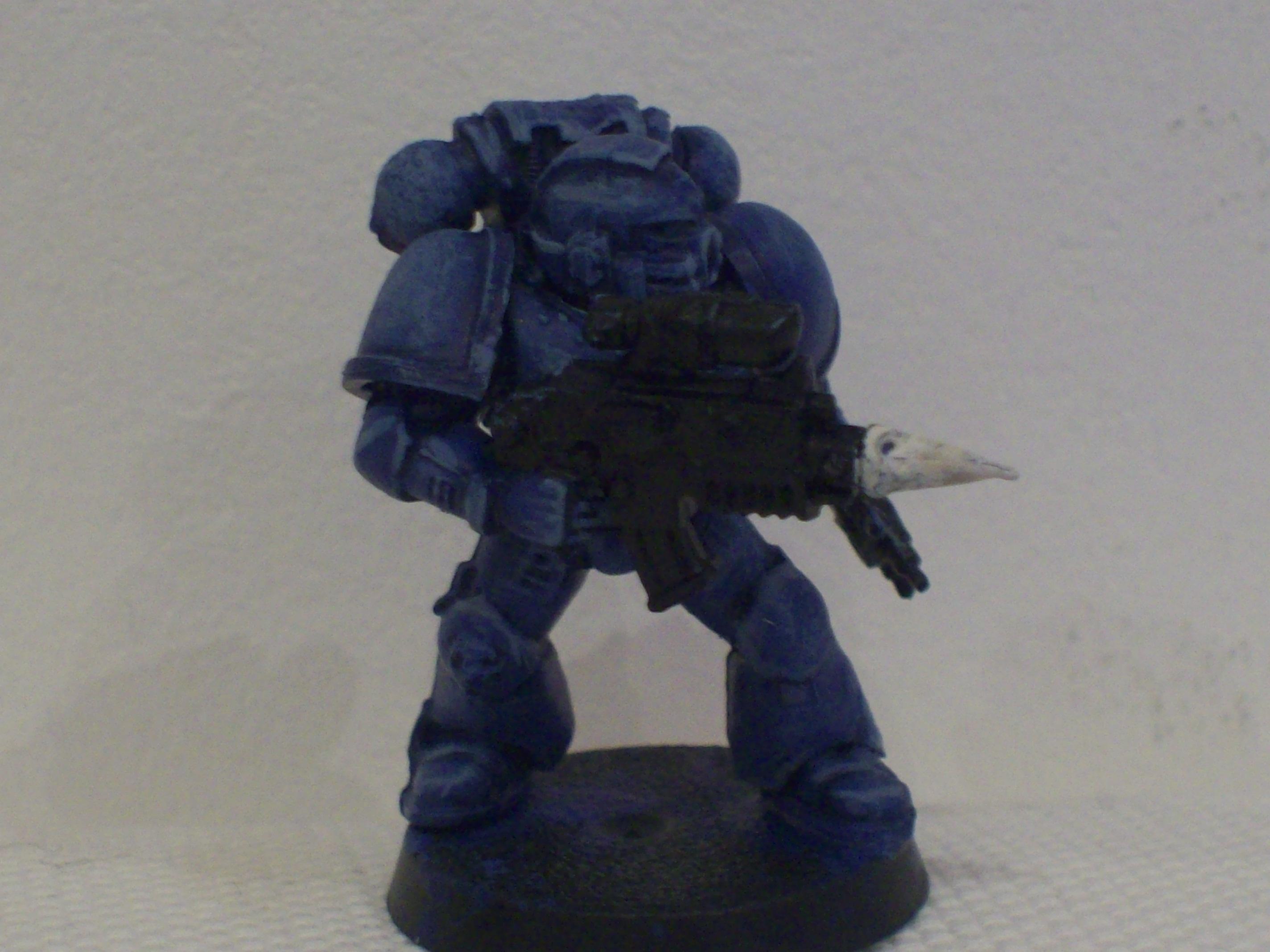 4.) I finally layered/highlighted the model with 1:2 of the same previous mix, and then 1:1. I drybrushed the 1:2 over the highlights, especially on smooth areas, such as shoulder pads, where there are no sharp edges to highlight