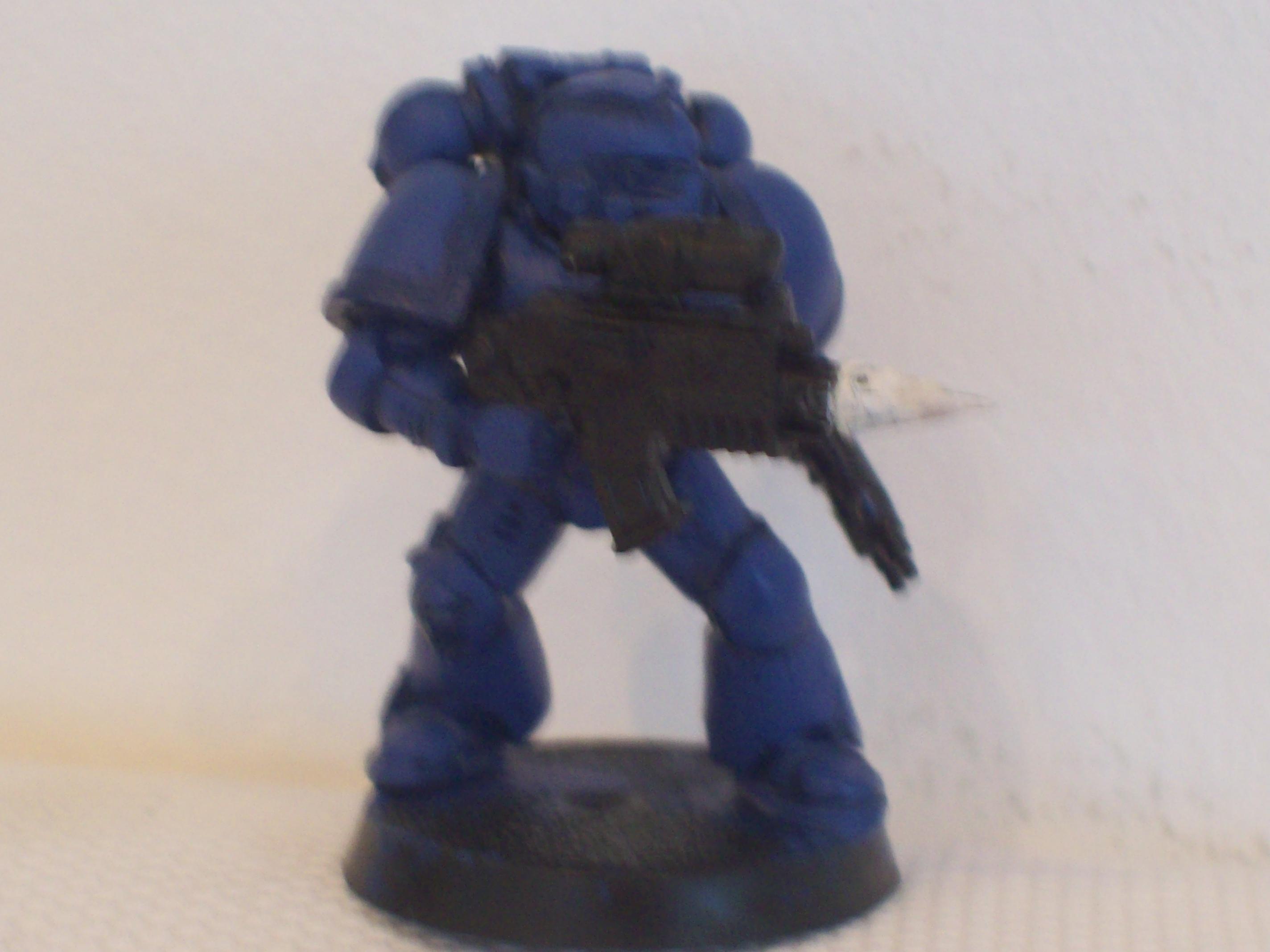 2.) I then layered on Mordian Blue, leaving Regal Blue in the recesses, in clean lines