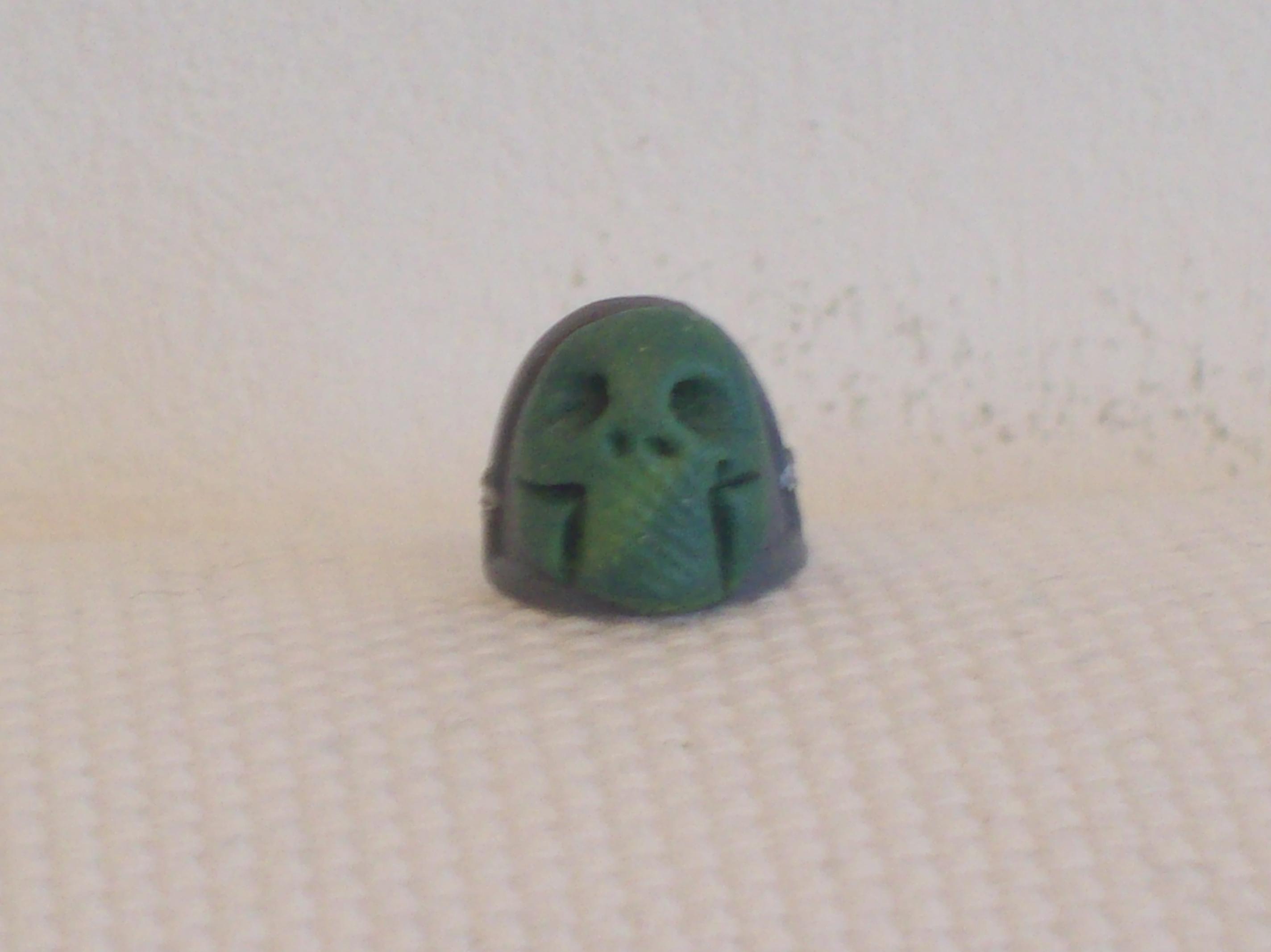 3.) Next cut two right angles out of the bottom sides of the skull