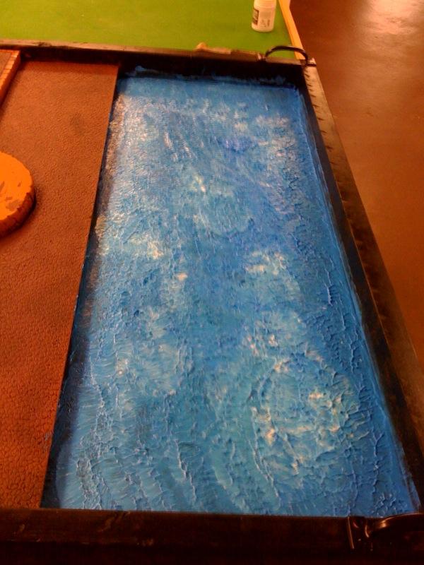 Vallejo water effects, its a thick mayonaise like paint