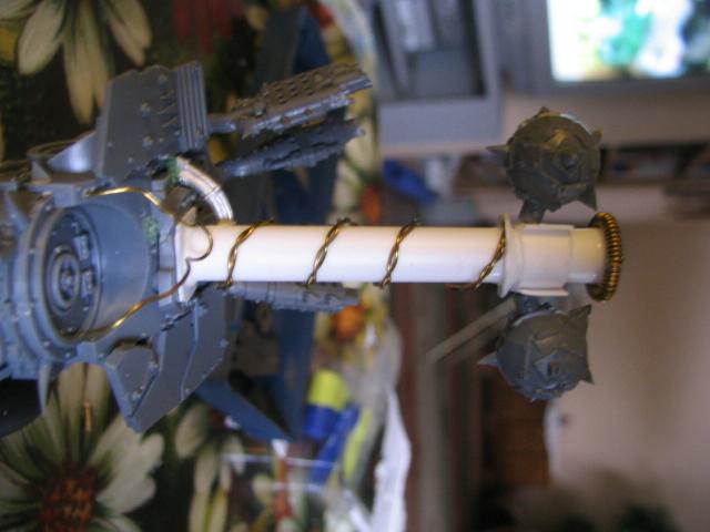 I added wires spiraling up the haft, i changed them later on but not dramatically