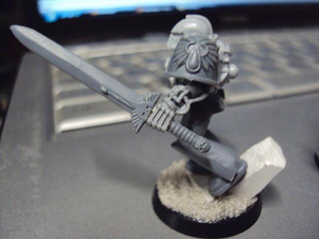 A nice show of his bionics and champion's blade as a sign of his former position in his battle company