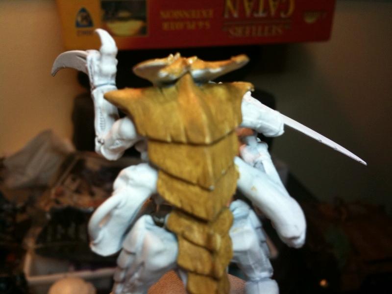 Tyranids, desert yello thin coat. Going to try and get the first layers b4 bed. 