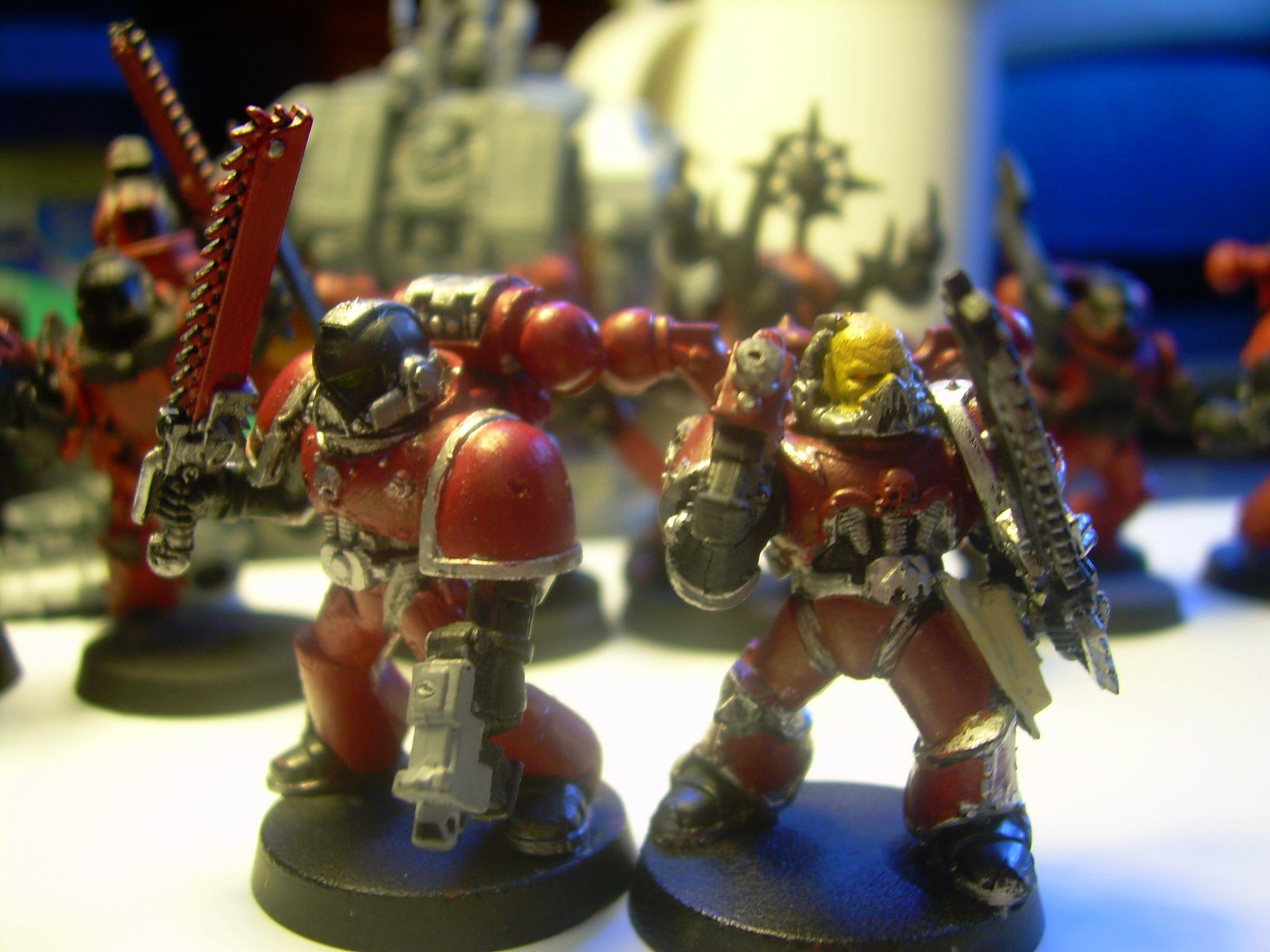 these are test models for dipping, a little more detail and then i will try it out. Both are basecoat red and the left has a layer of red gore and right has a layer of scab red. 