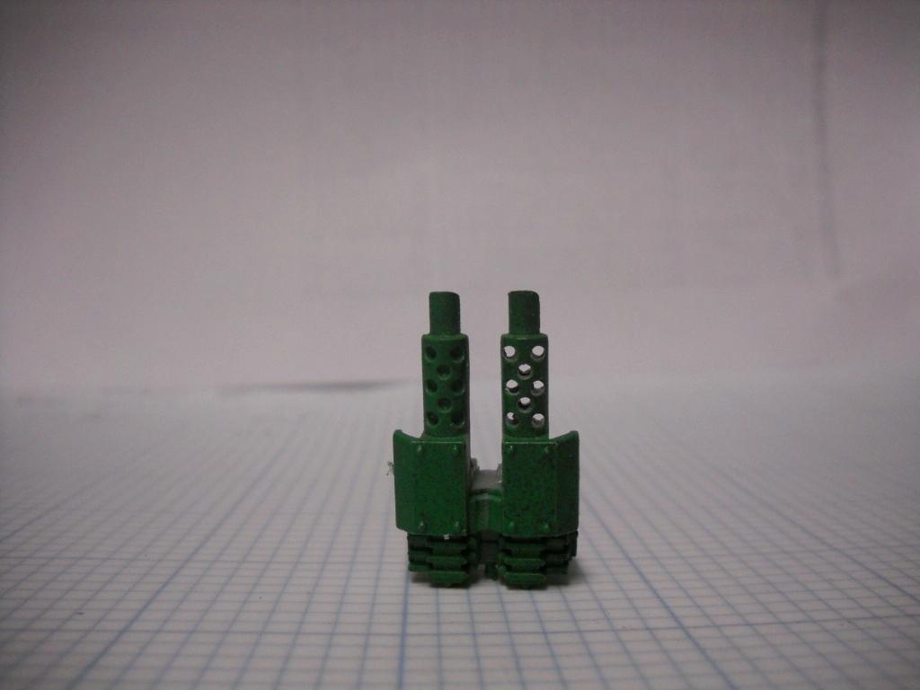 Drilled some holes on my exhust.  Took shot half way through to show diffrence
