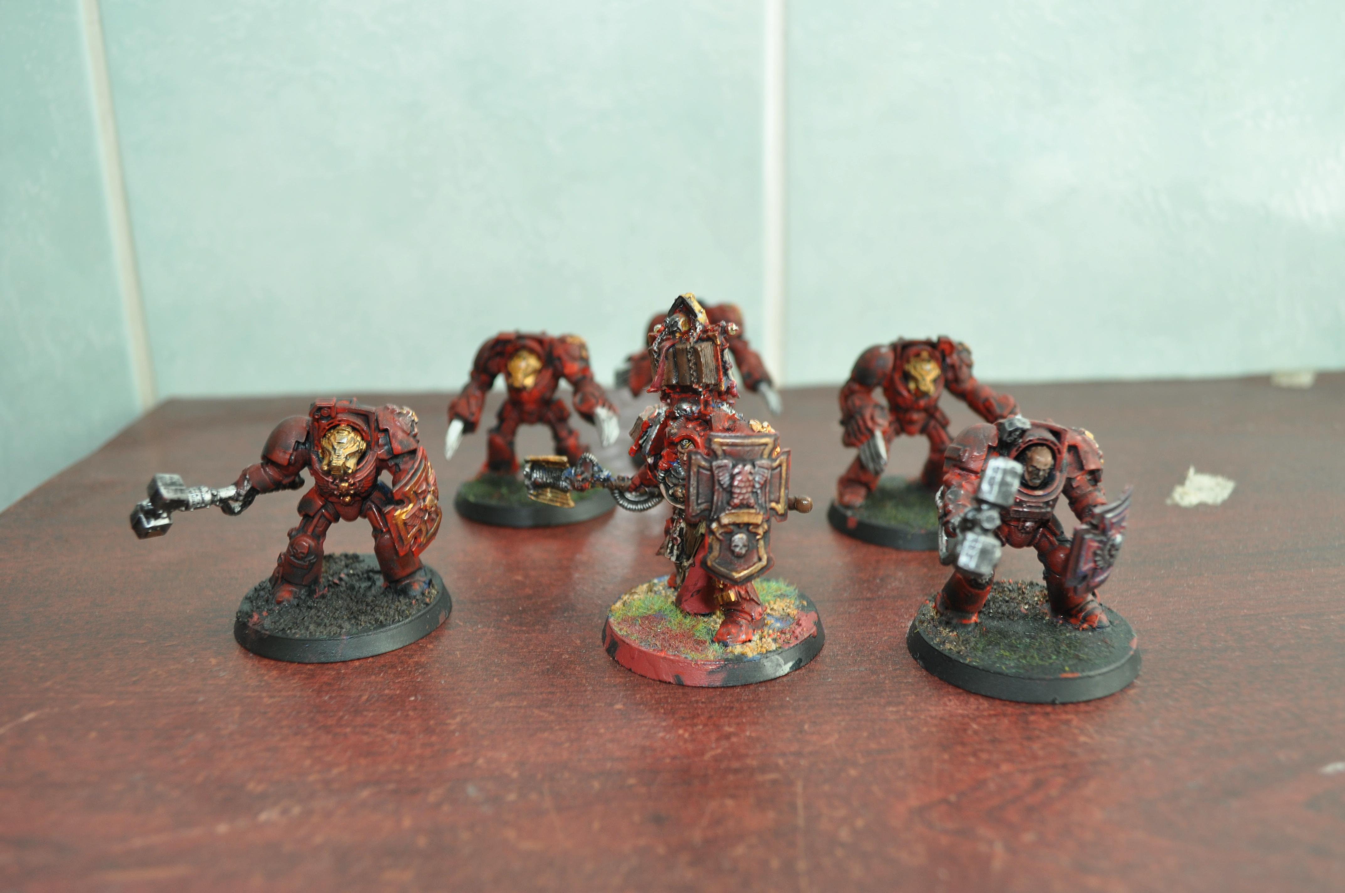 Him with his retinue, I havent finished painting them yet and soon enough I'll have a land raider crusaider painted up for them too