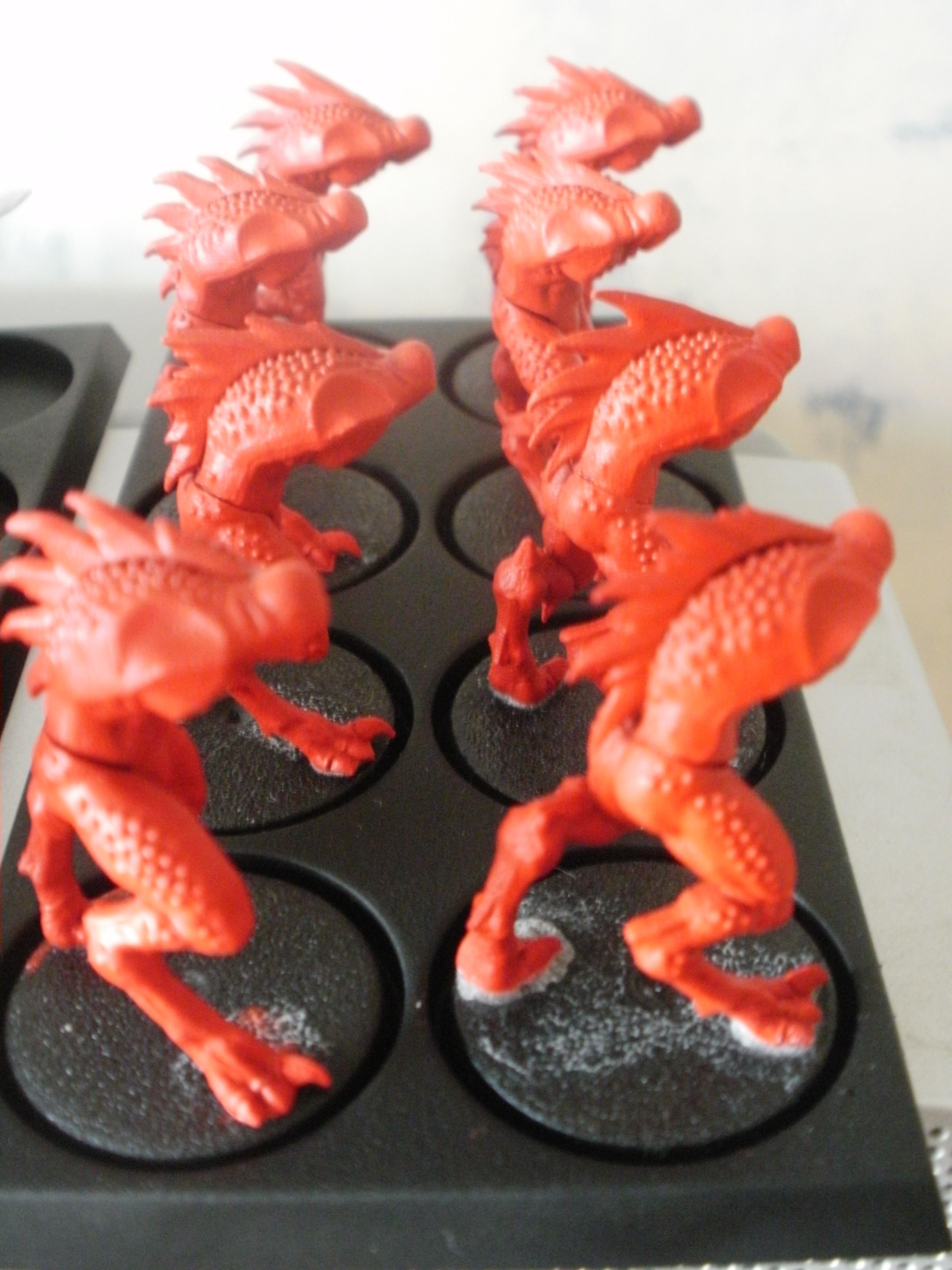 tirst I paint body and other parts with colour primer pure red from army painter