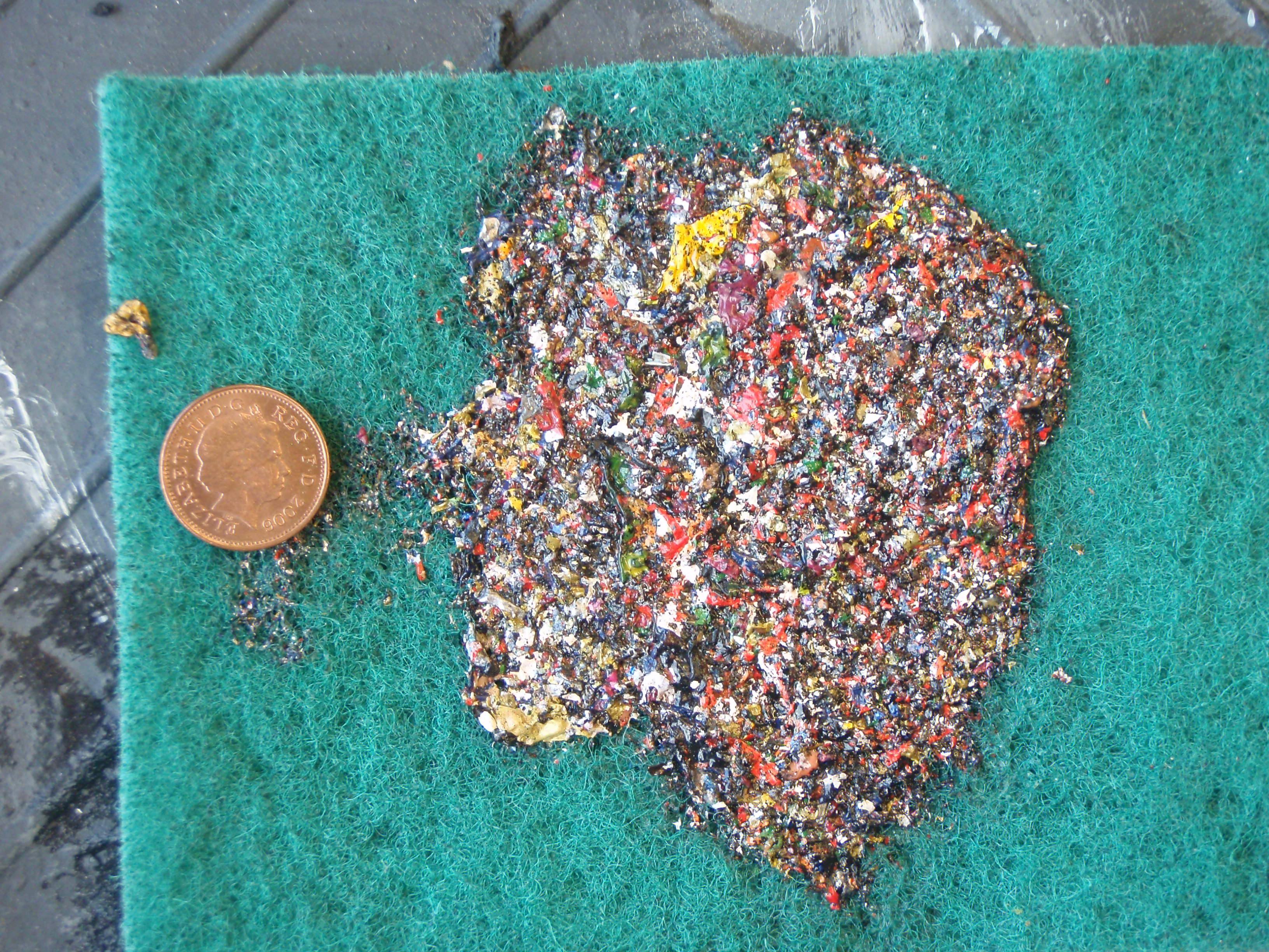 The sludge at the bottom of the strip. Penny for scale!