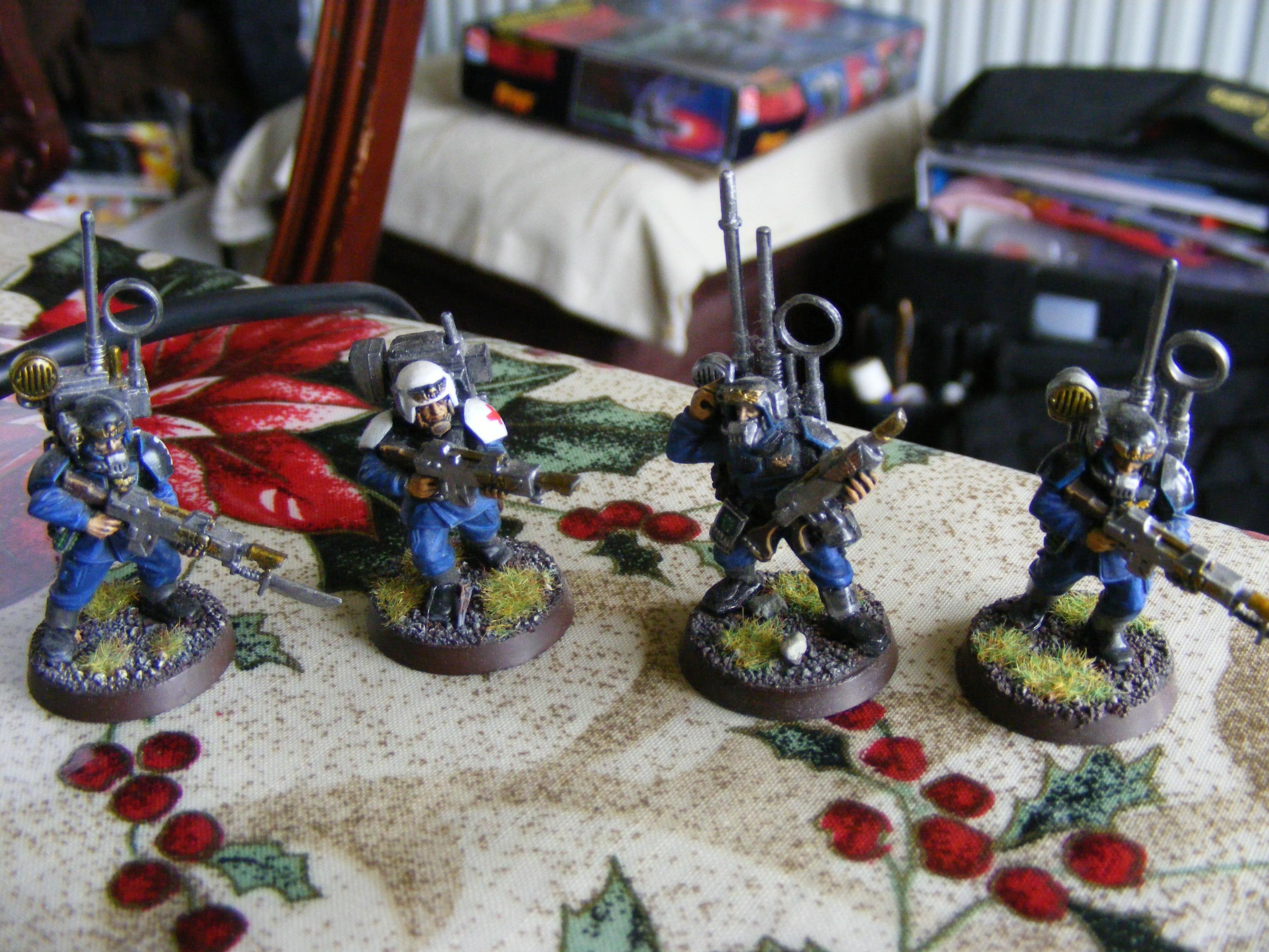 a medic in a comms unit, front view