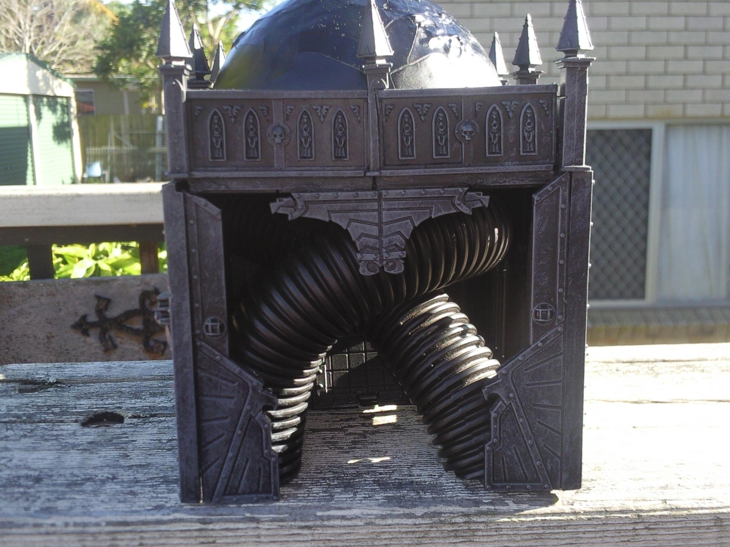 Rear, showing cable-work going into floor