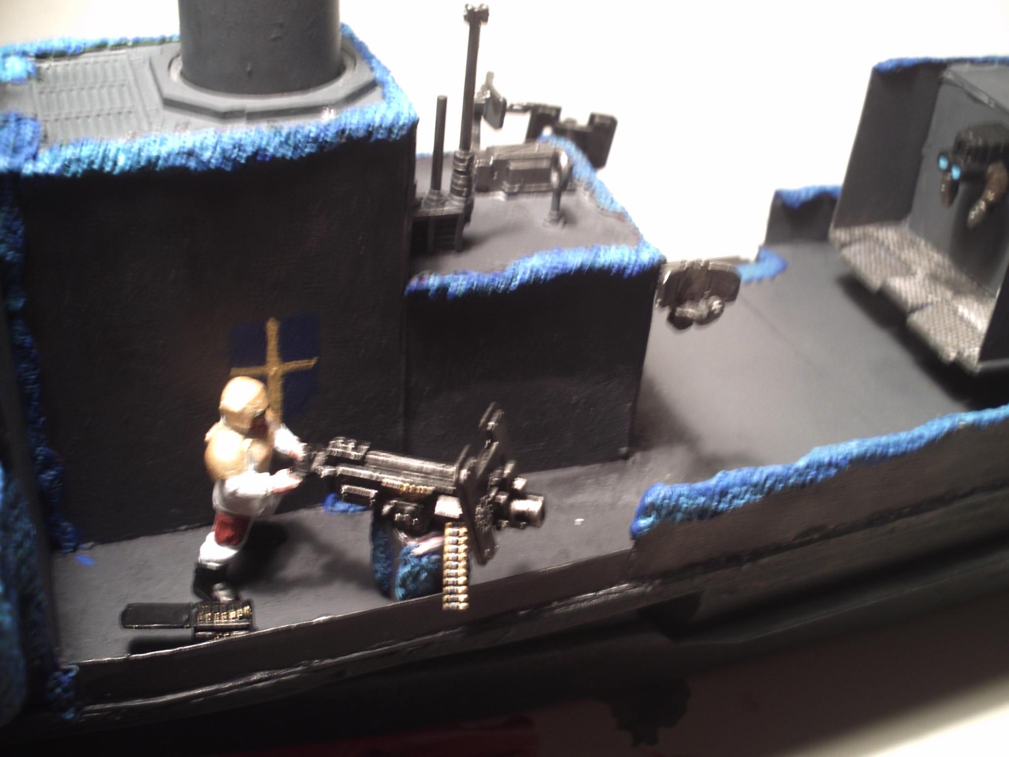 Portside gunner with naval flag