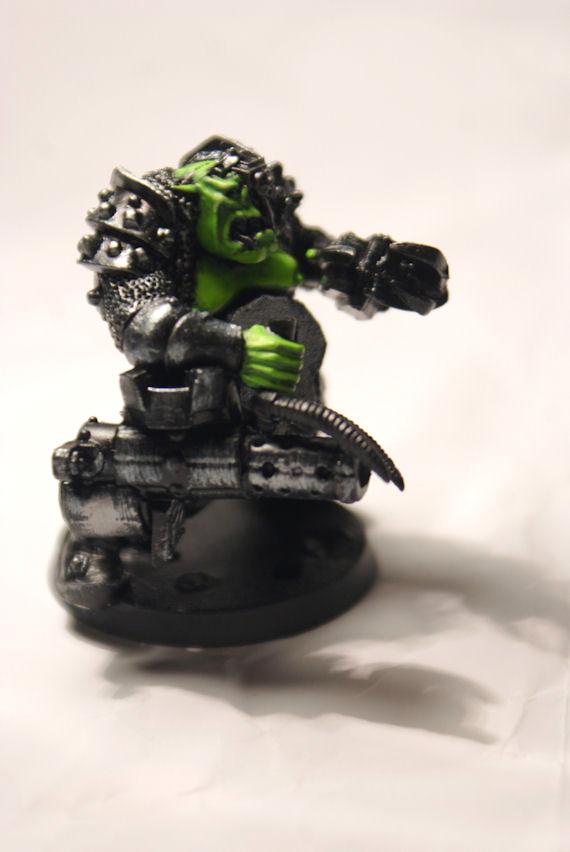 I started work today on my Warboss, I got him assembled and his skin painted. I'm fairly happy with the skintone