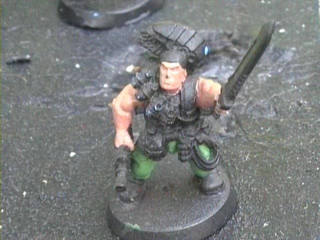 catachan captain leading charge against scouts