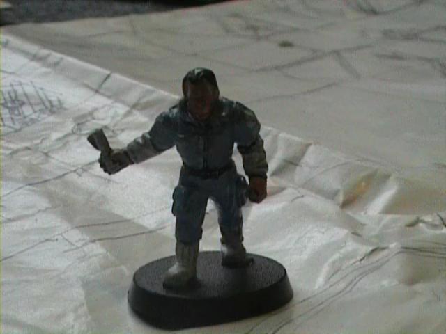 Ash with rolled up newspaper