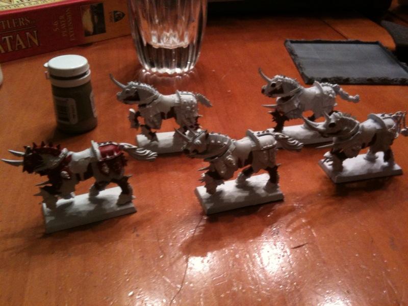 All five horses with the first one based with M. Red foundation paint