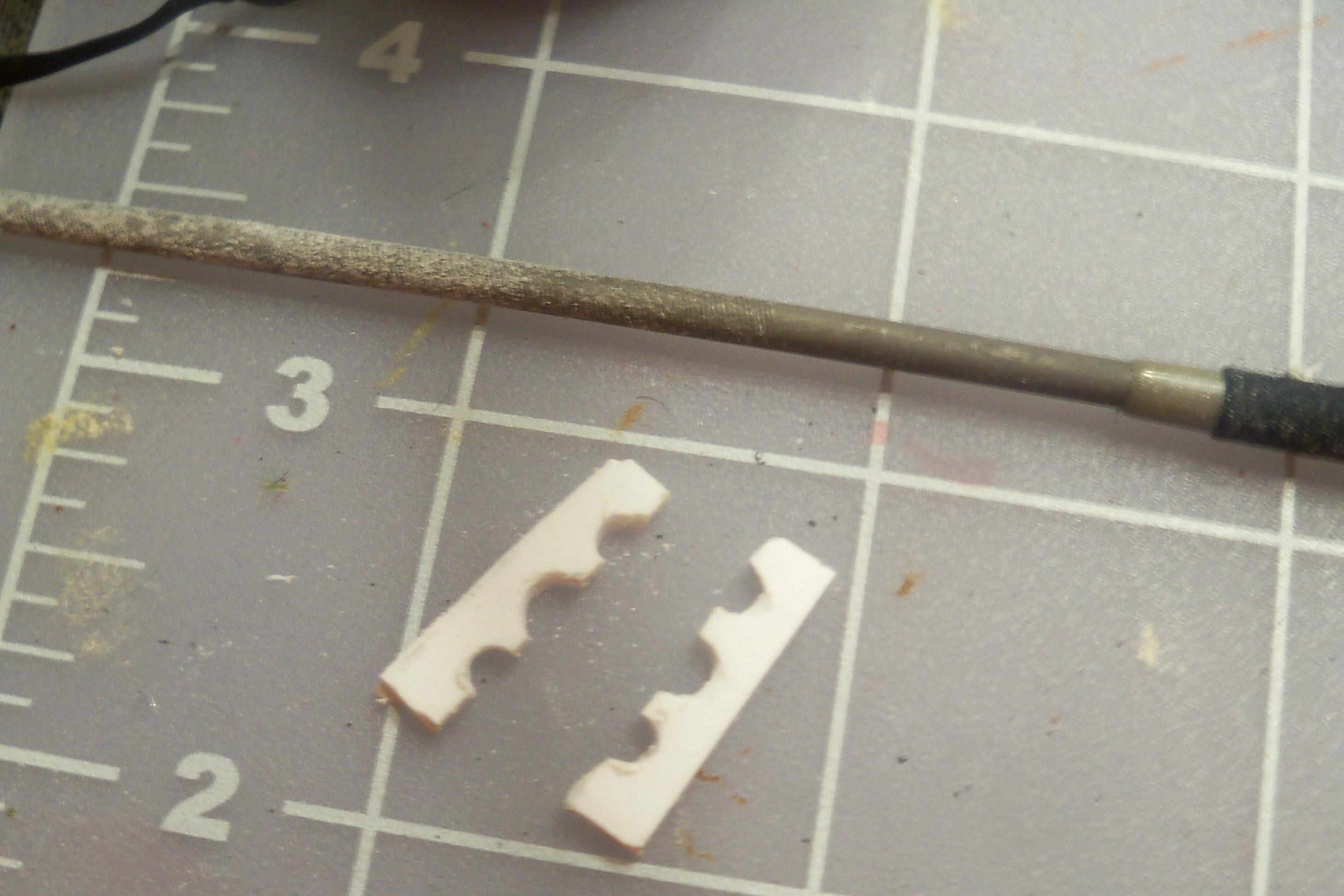 ground the holes back into shape