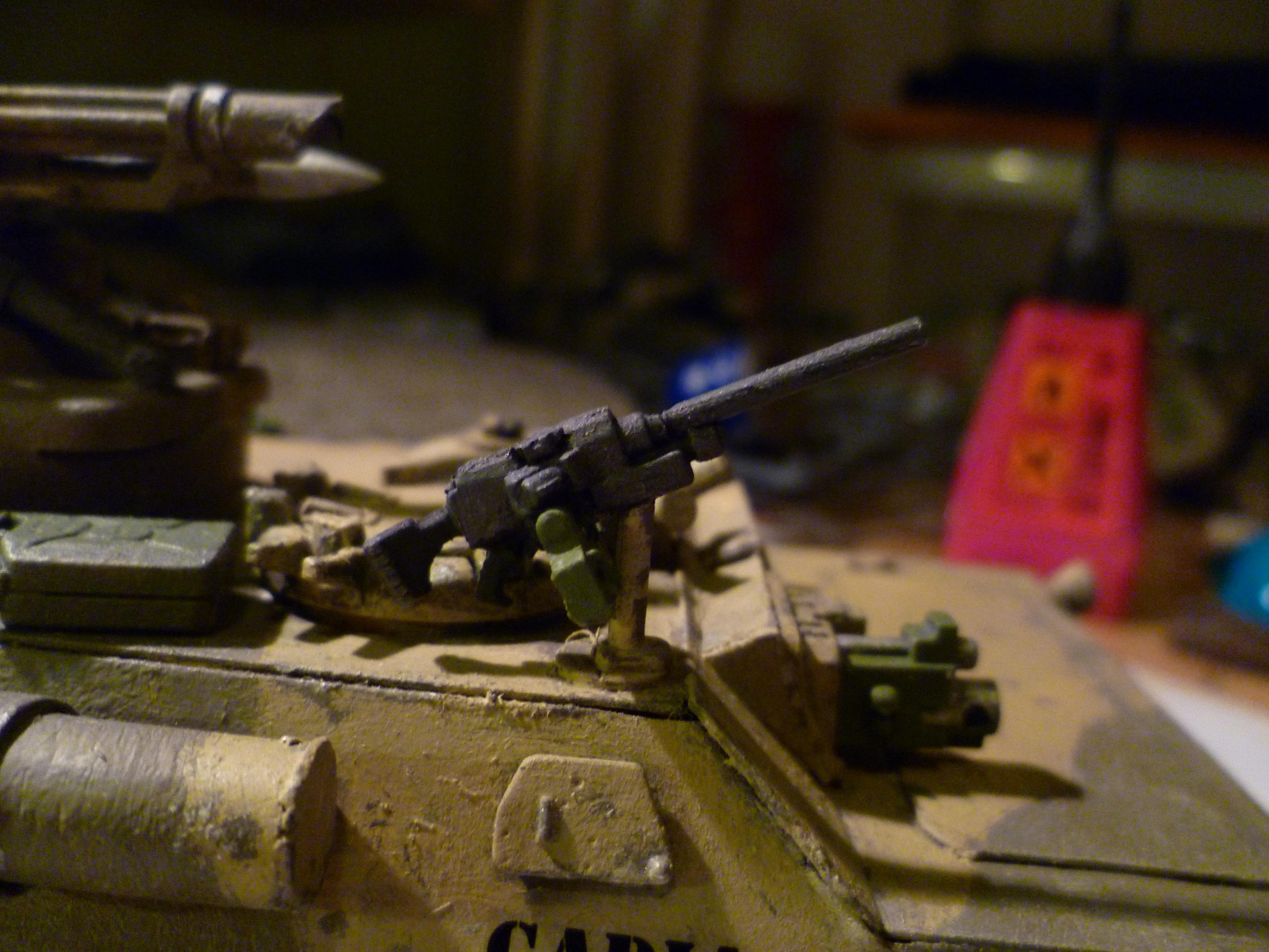 close up of the "heavy stubber" stand in.., it's made of a space marine scout sniper, lasgun, copper wire and a imperial guard track link to make the magazine