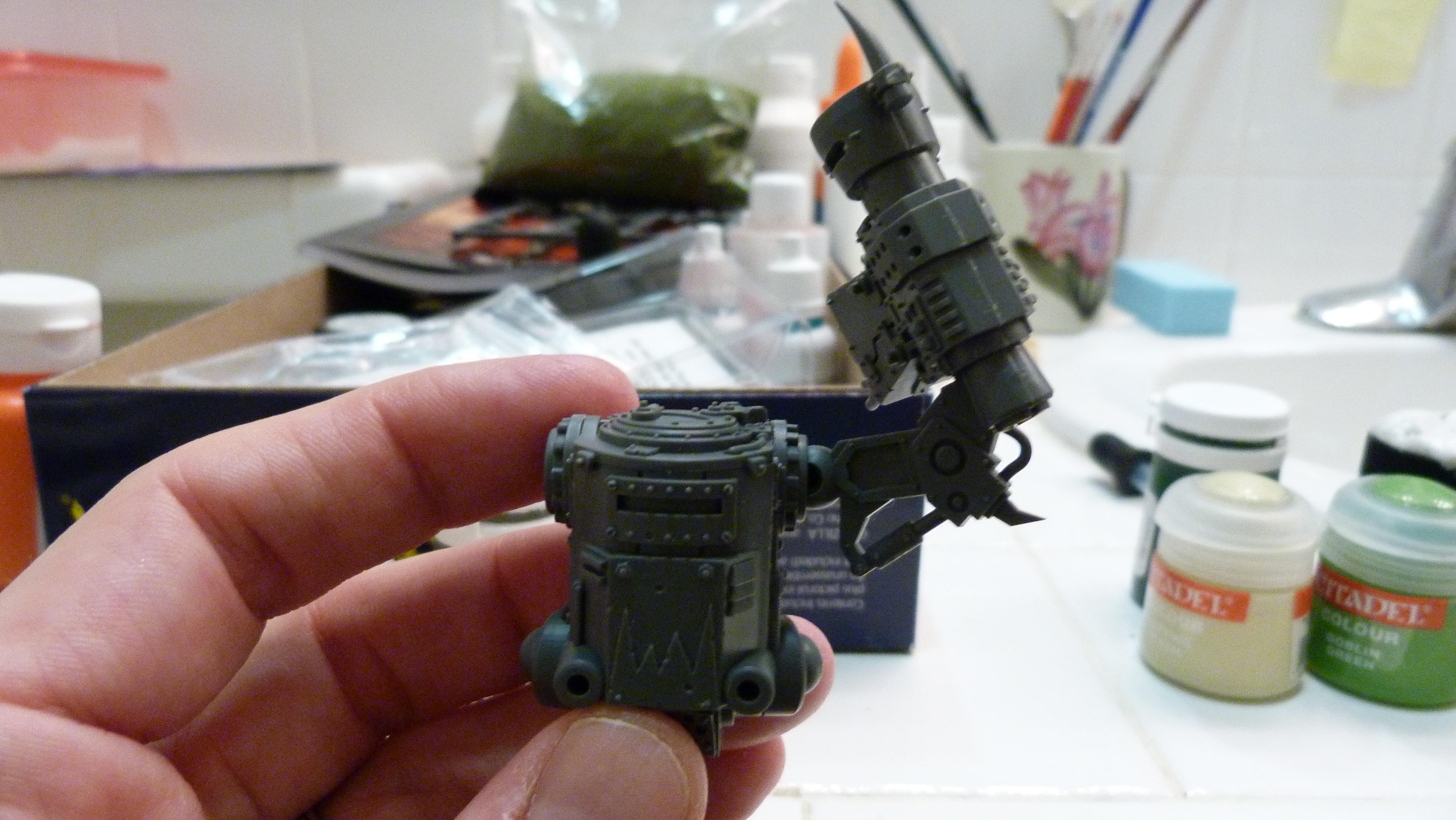Killa kan with magnetized arm up