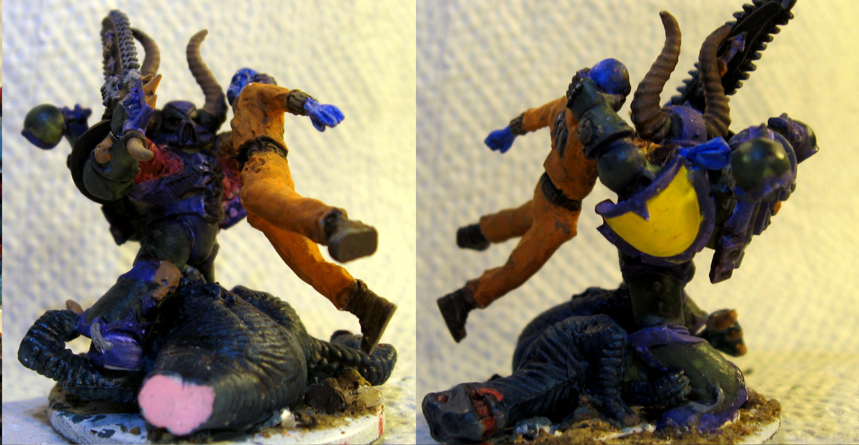 Chaos Space Marine strangling a Tau