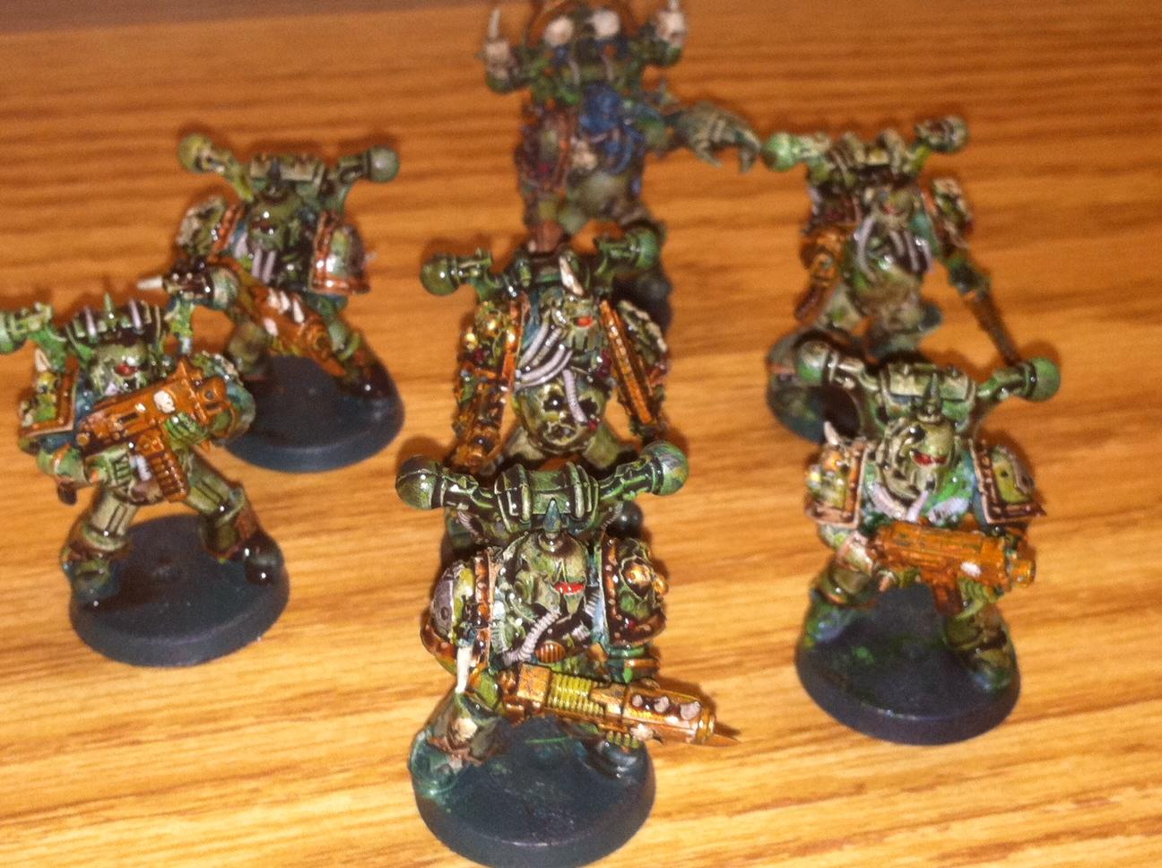 Unit of my Plague Marines, wash still slightly wet in this picture